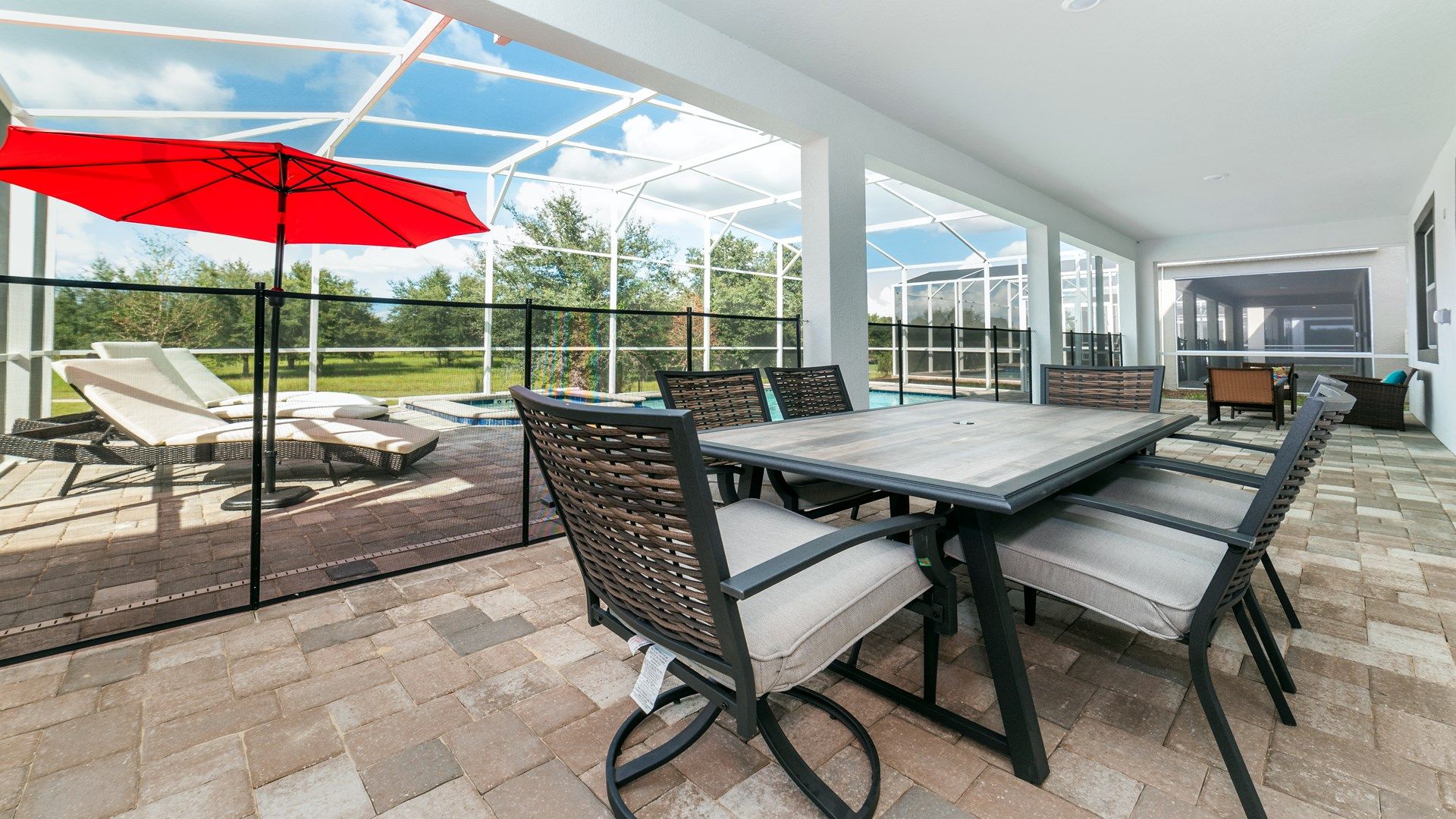 Relax and dine outdoors by the pool with scenic views and seating!