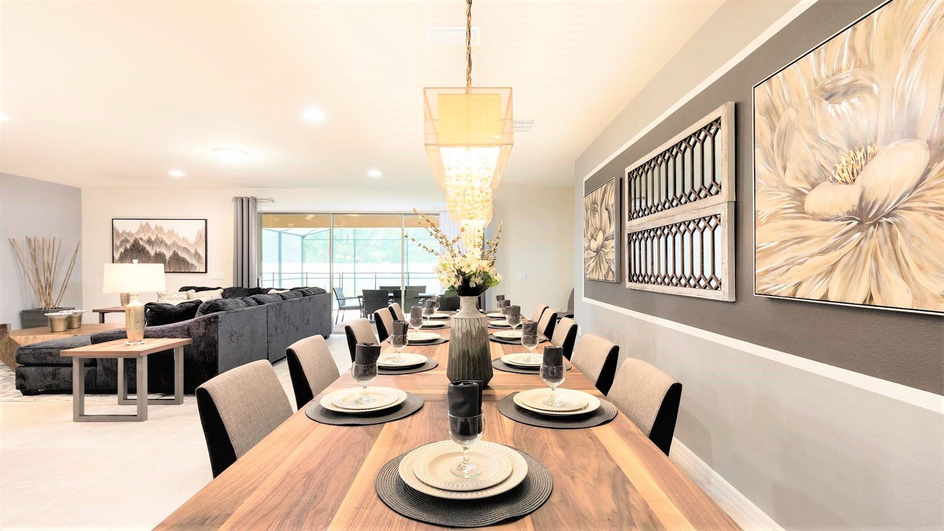 Elegant dining area with seating for 10, chic decor & warm lighting!