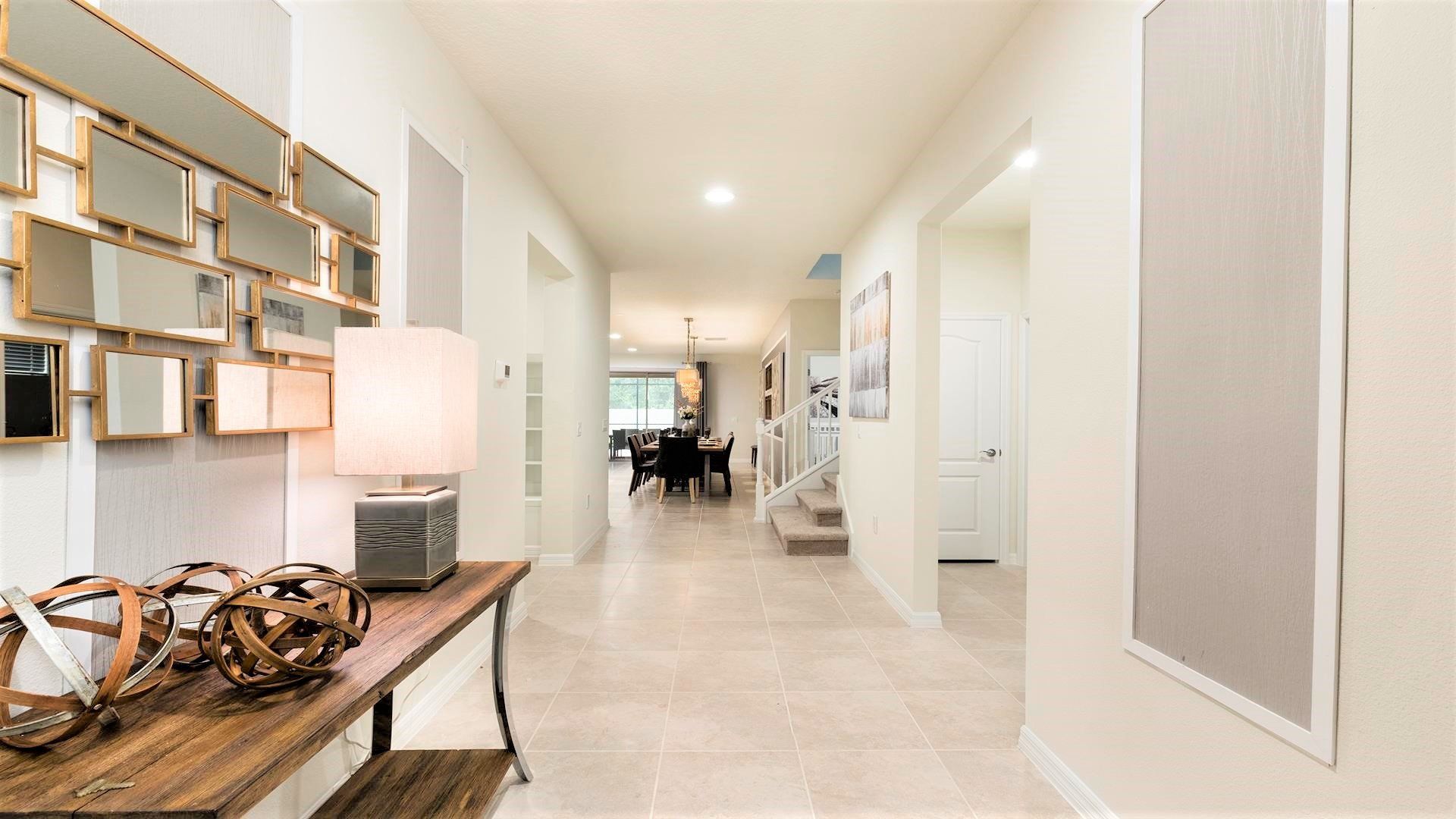 Bright and stylish entryway with modern decor and elegant touches!