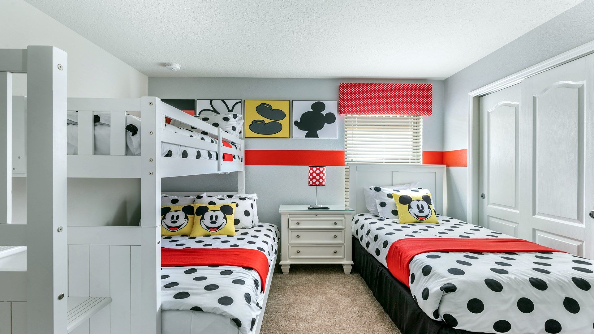 Kids will have fun in this Mickey mouse themed bedroom.