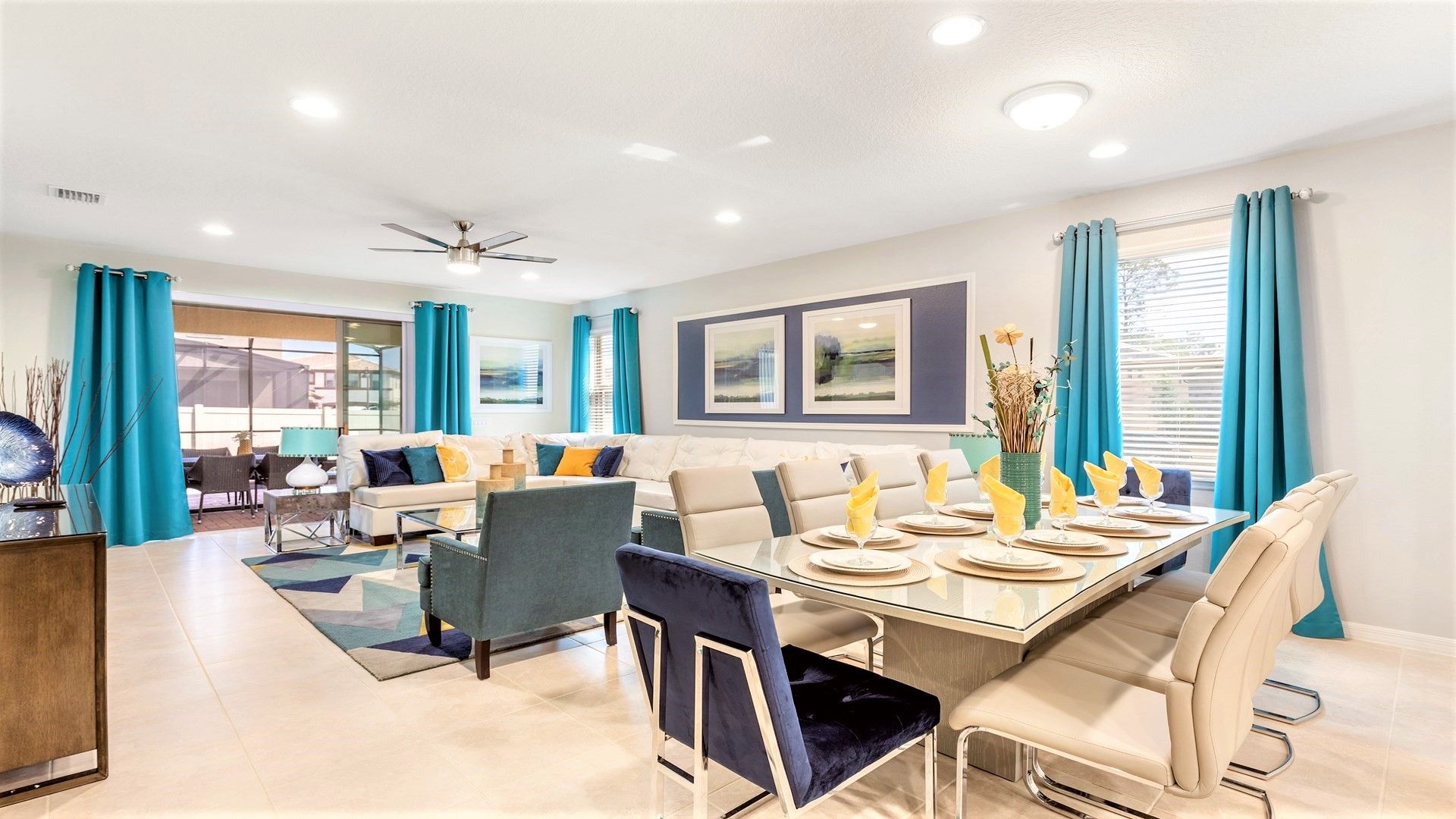 Bright open-concept living and dining area with modern decor and vibrant accents.