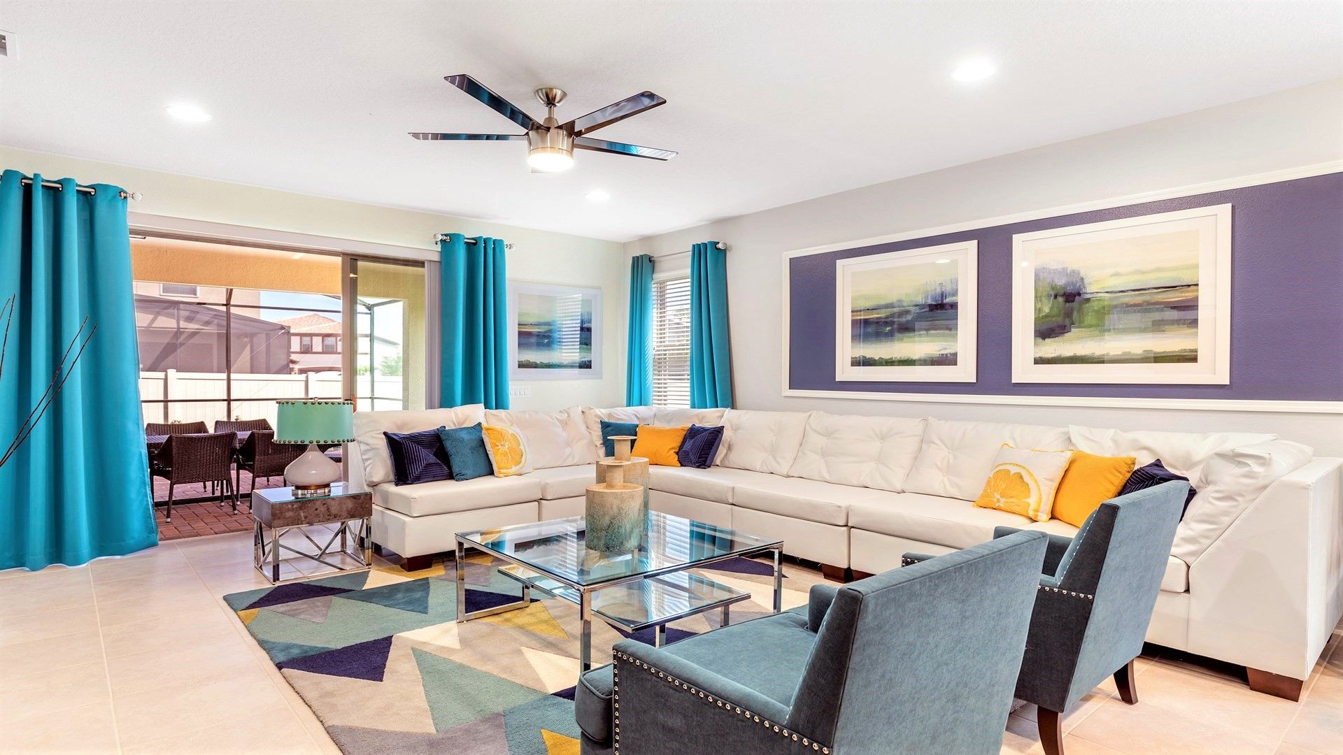 Spacious living room area with cozy sofa, perfect for family reunion.