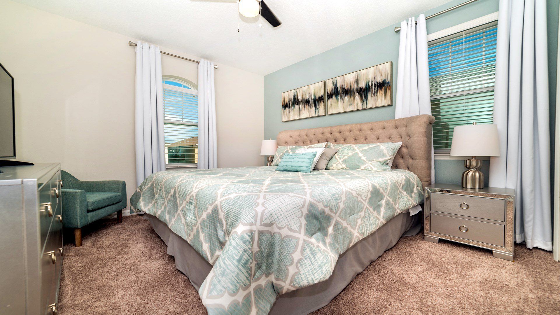 Elevate your king bedroom with a blend of sophistication and entertainment. A regal bed takes center stage, complemented by stylish decor and the convenience of a carefully positioned TV.