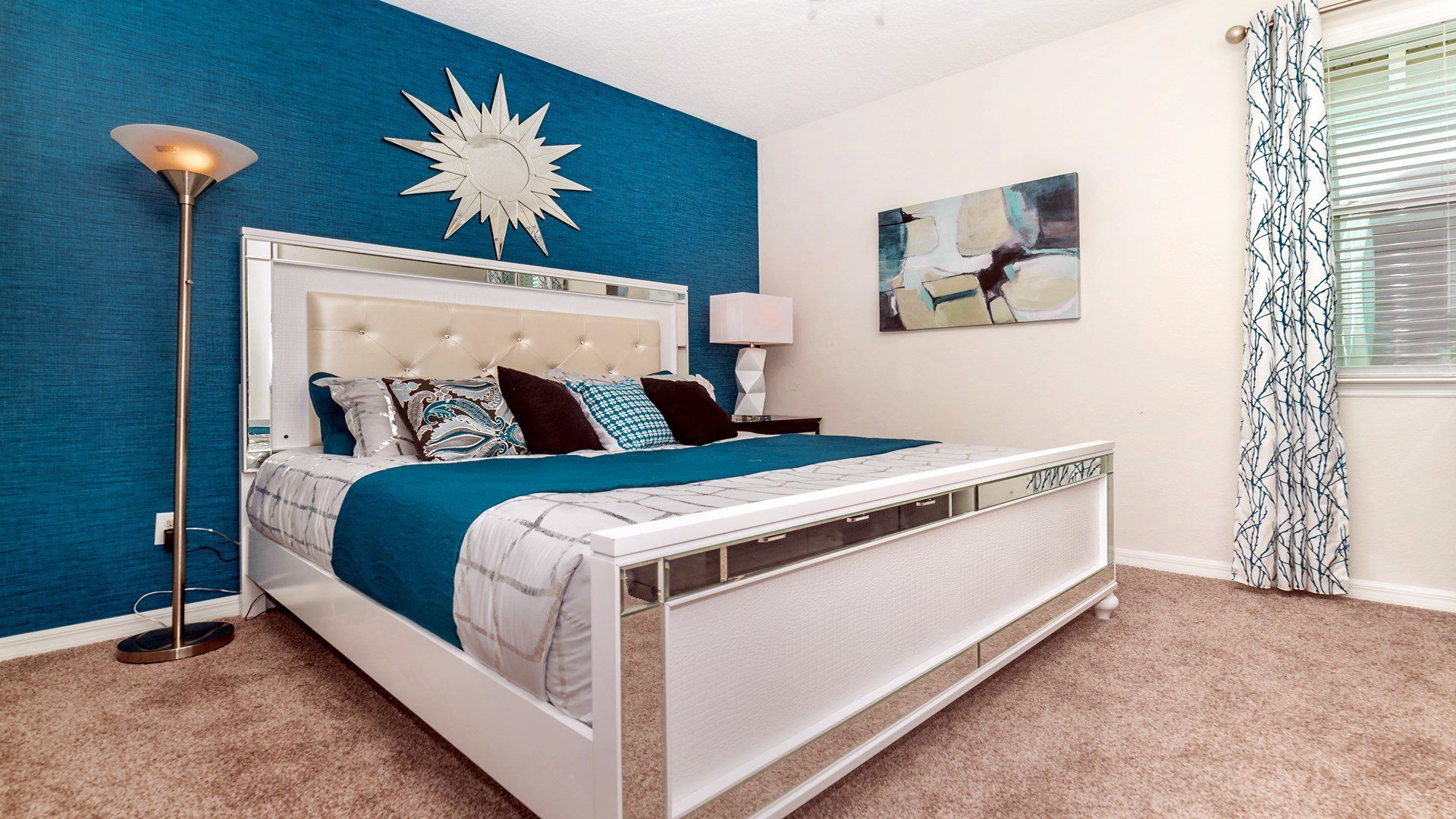 Indulge in royal comfort in the king bedroom, where a luxurious bed takes center stage, complemented by the convenience of a strategically placed TV