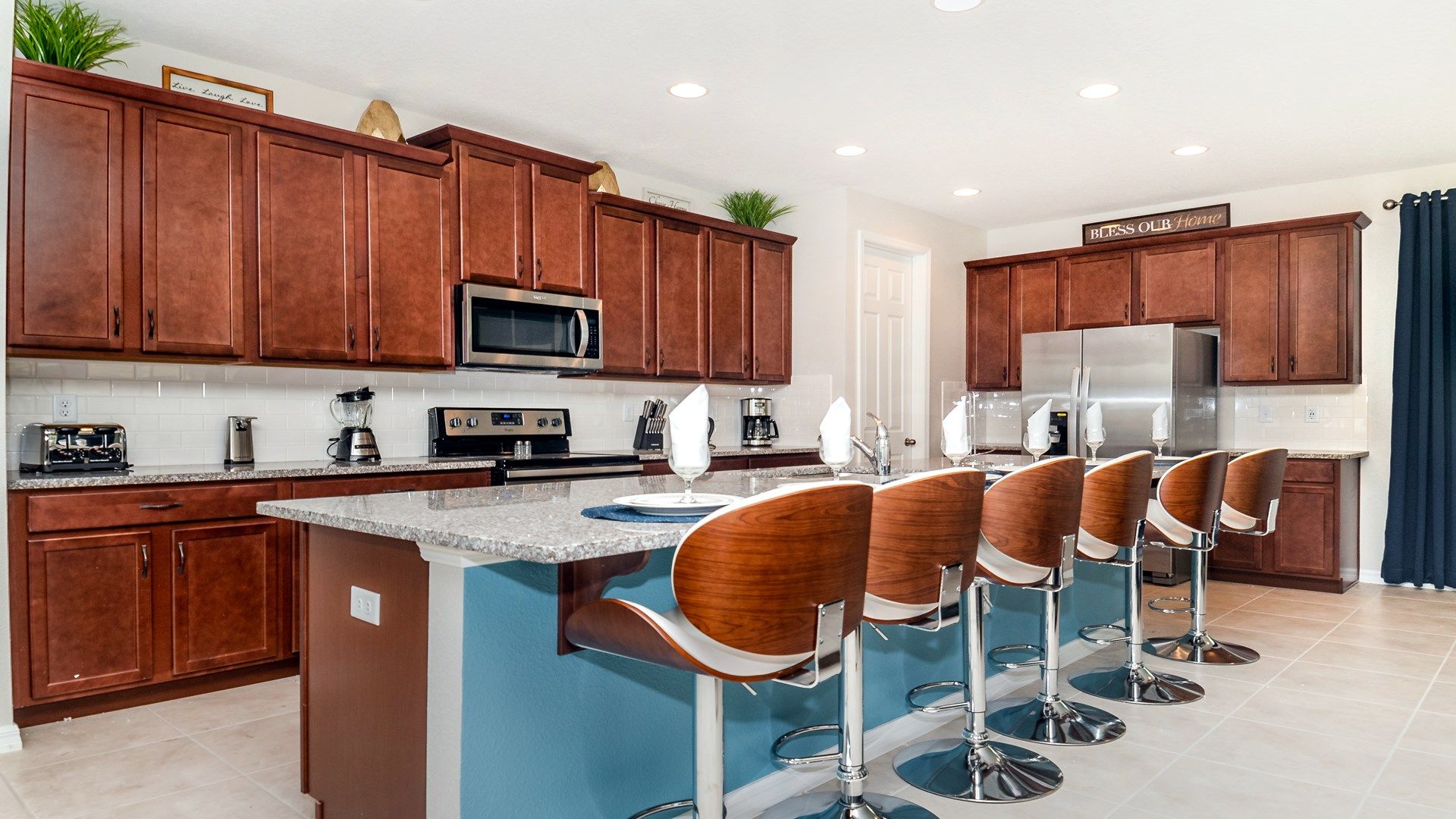 Savor the convenience of a stylish breakfast bar, offering a chic and casual space for morning gatherings or quick bites