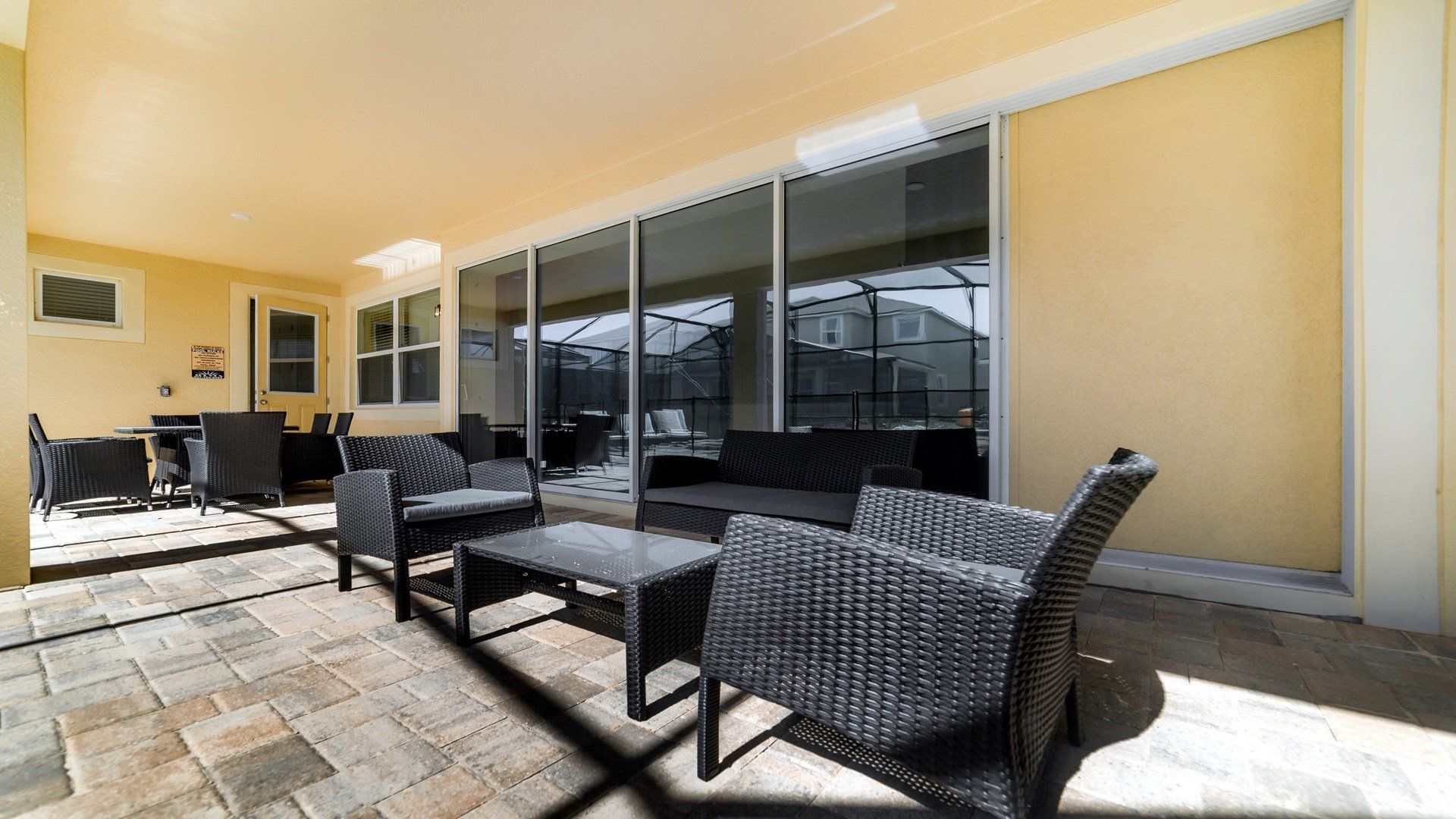 Extend your leisure experience with outdoor seating nestled beside the shimmering pool