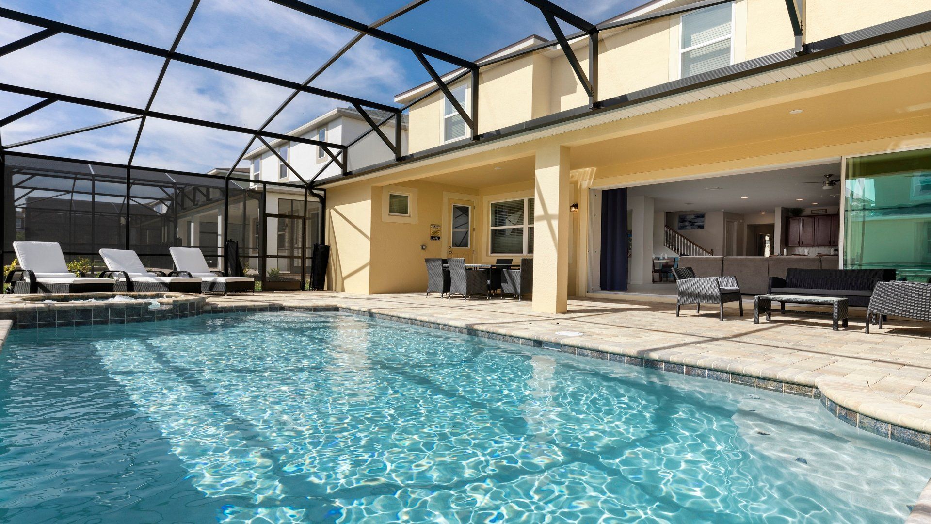 Enjoy exclusive access to the screened-in spa and pool, ensuring a private oasis for your relaxation and recreation.