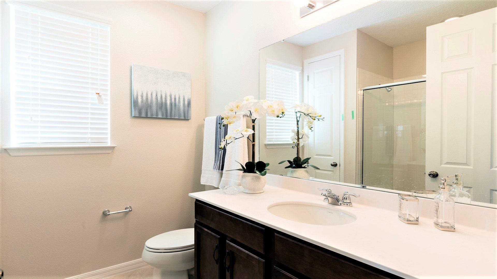 Indulge in the luxury of a full bathroom, complete with modern amenities and elegant finishes, providing a spa-like oasis for your personal comfort and relaxation