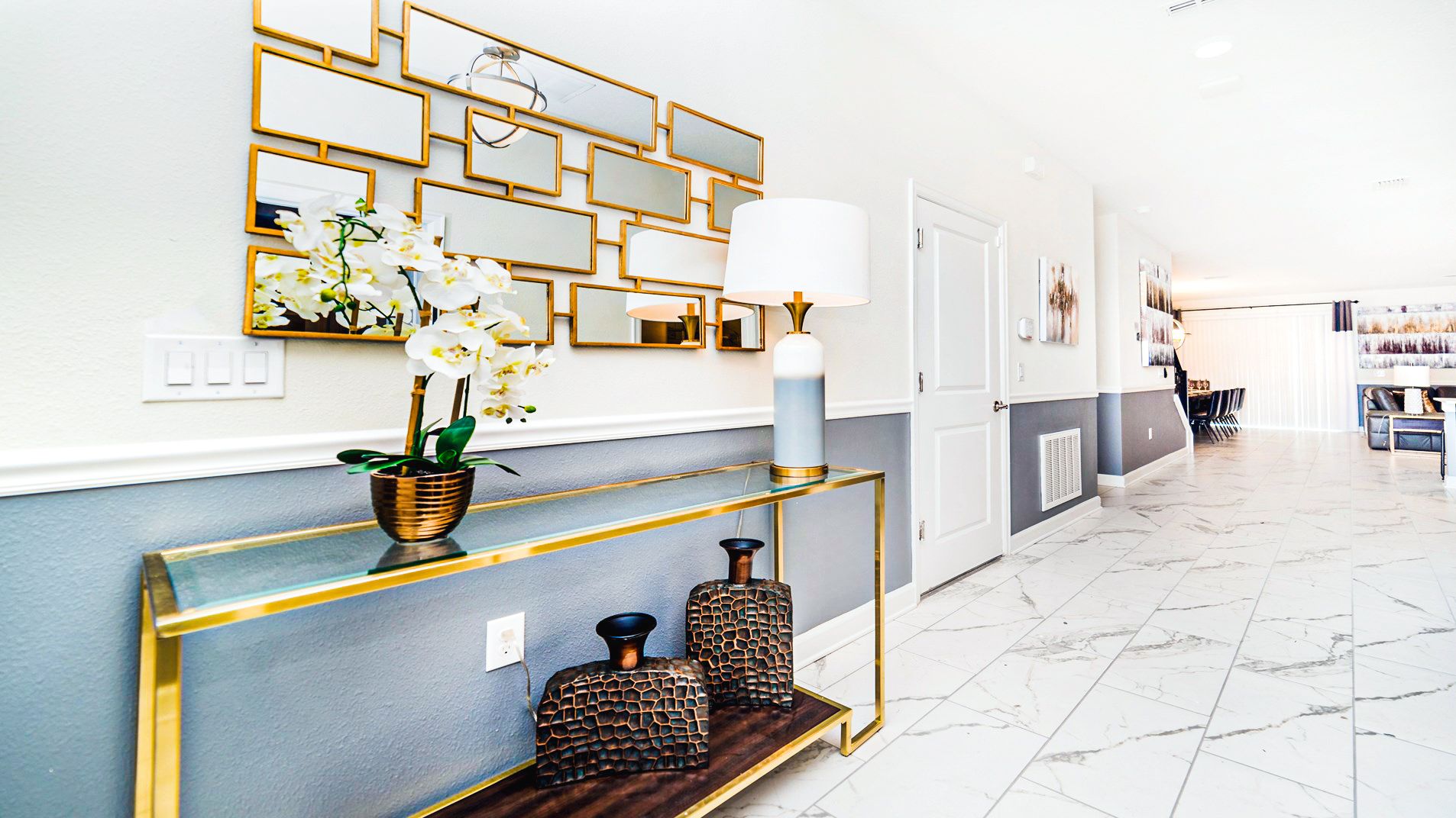 Elegant hallway sets the tone for luxury living.