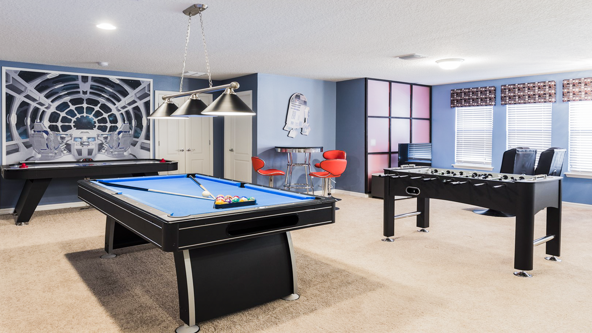 Exciting space with a pool table and foosball setuphttps://gallery.streamlinevrs.com/units-gallery/00/06/F8/image_164327711.png for endless entertainment.