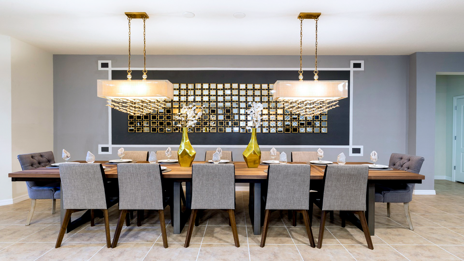 Elegant dining space with modern charm, golden accents, and seating for ten guests.