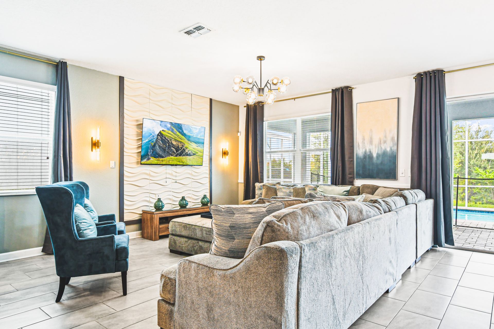 Inviting living space, cozy and complete with a television for a perfect blend of comfort and entertainment