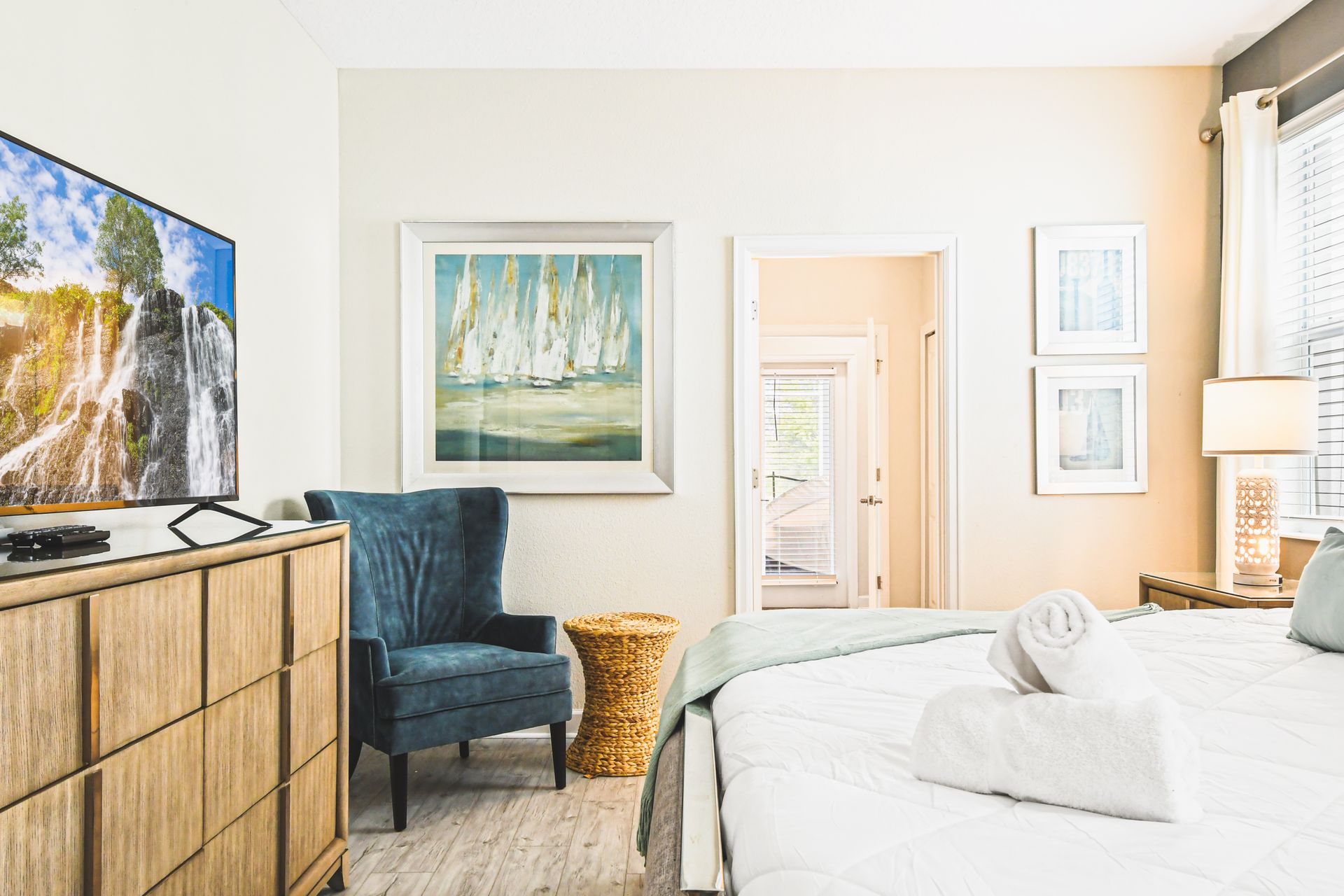 Elegant bedroom featuring a TV for refined relaxation and entertainment