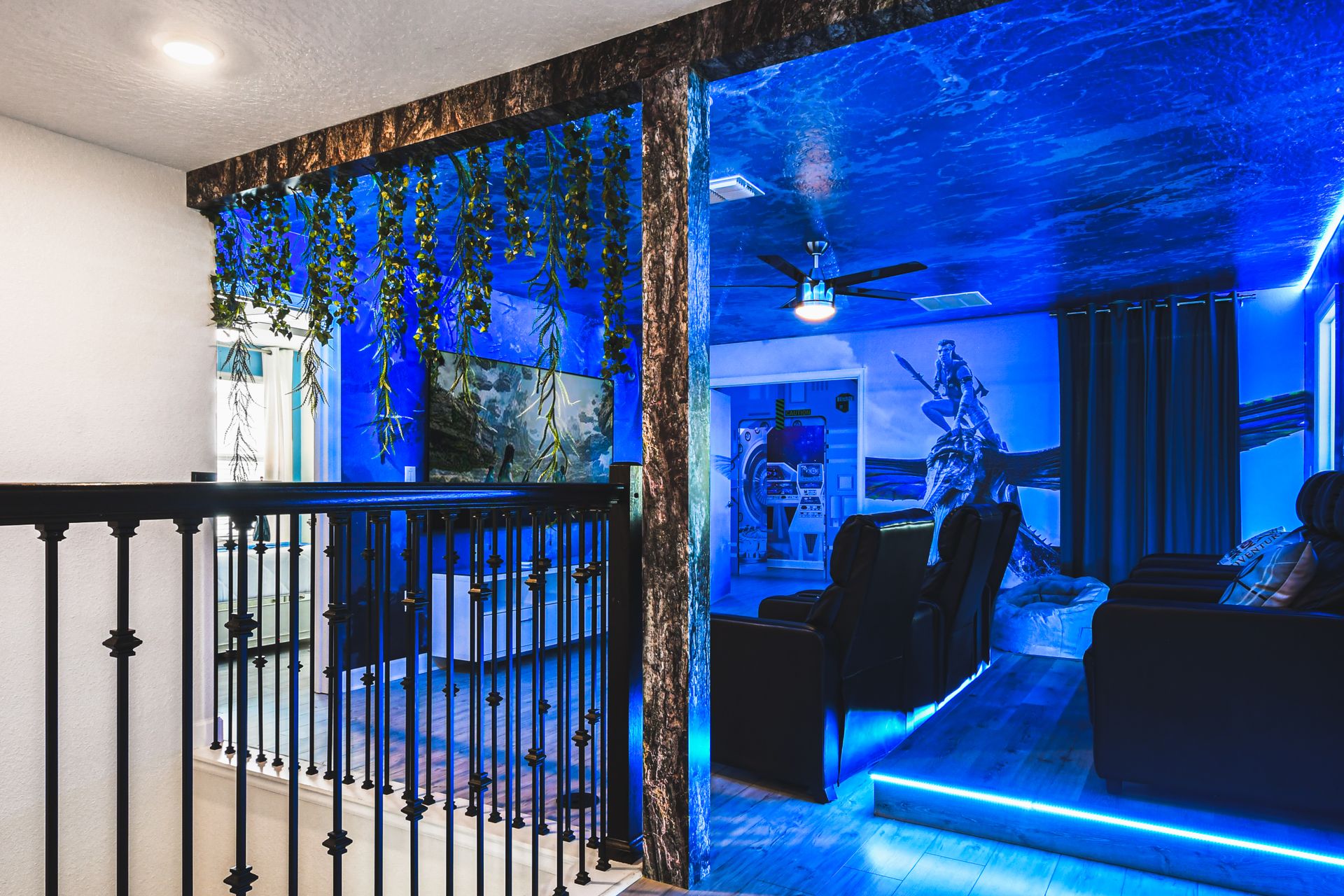 Avatar-themed theater room, immersed in water-inspired ambiance