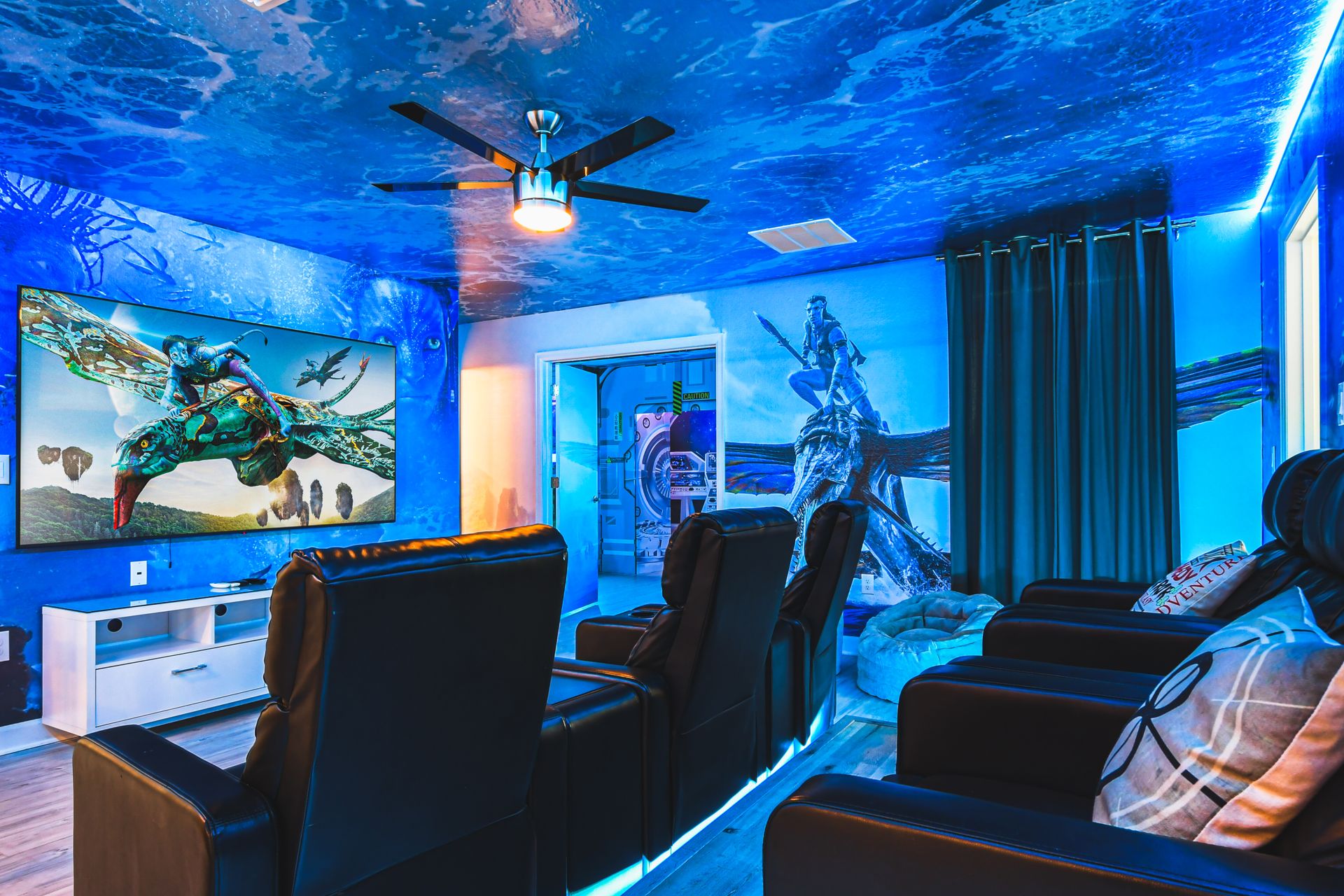 Avatar-themed theater room, immersed in water-inspired ambiance
