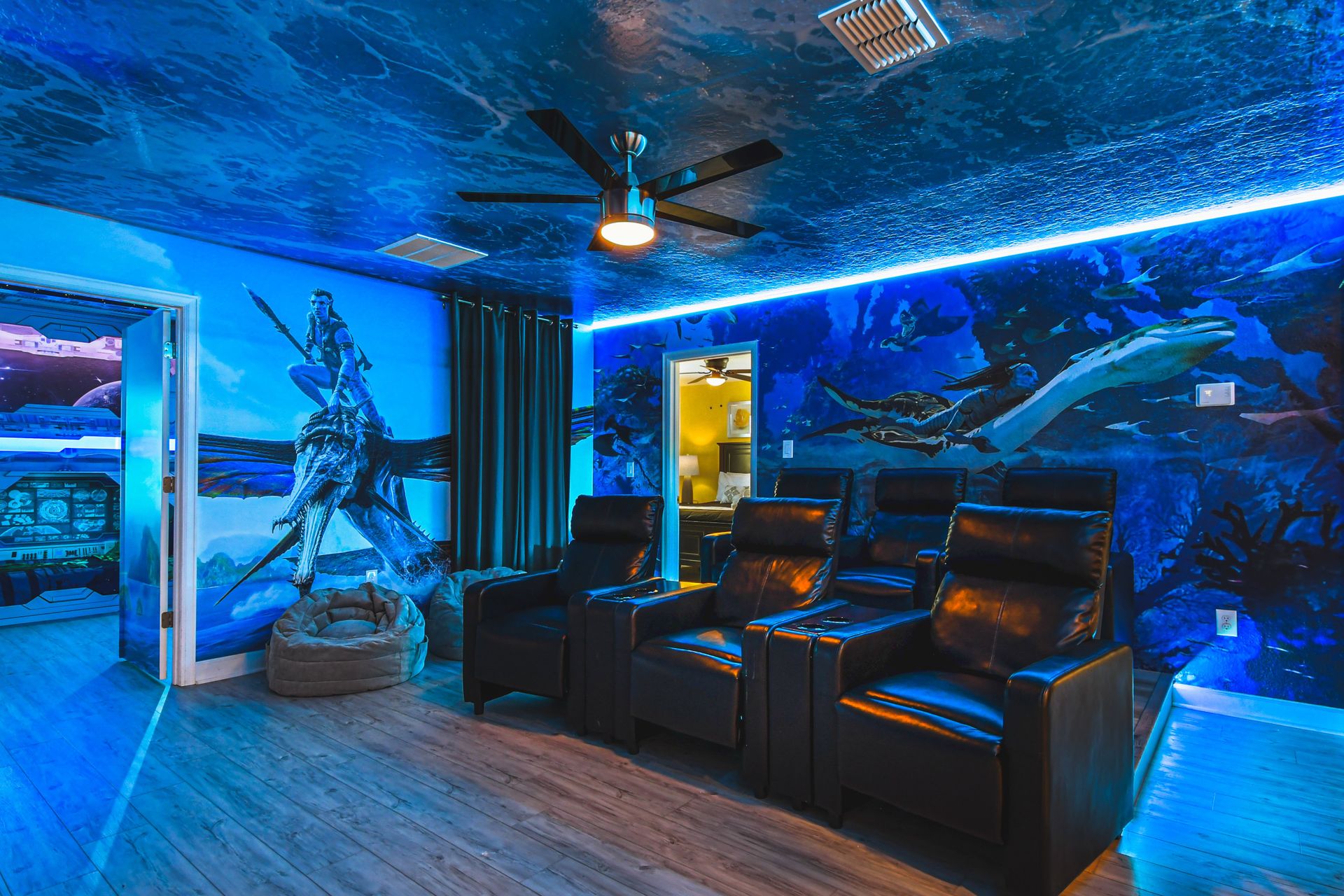 Avatar-themed theater room, immersed in water-inspired ambiance