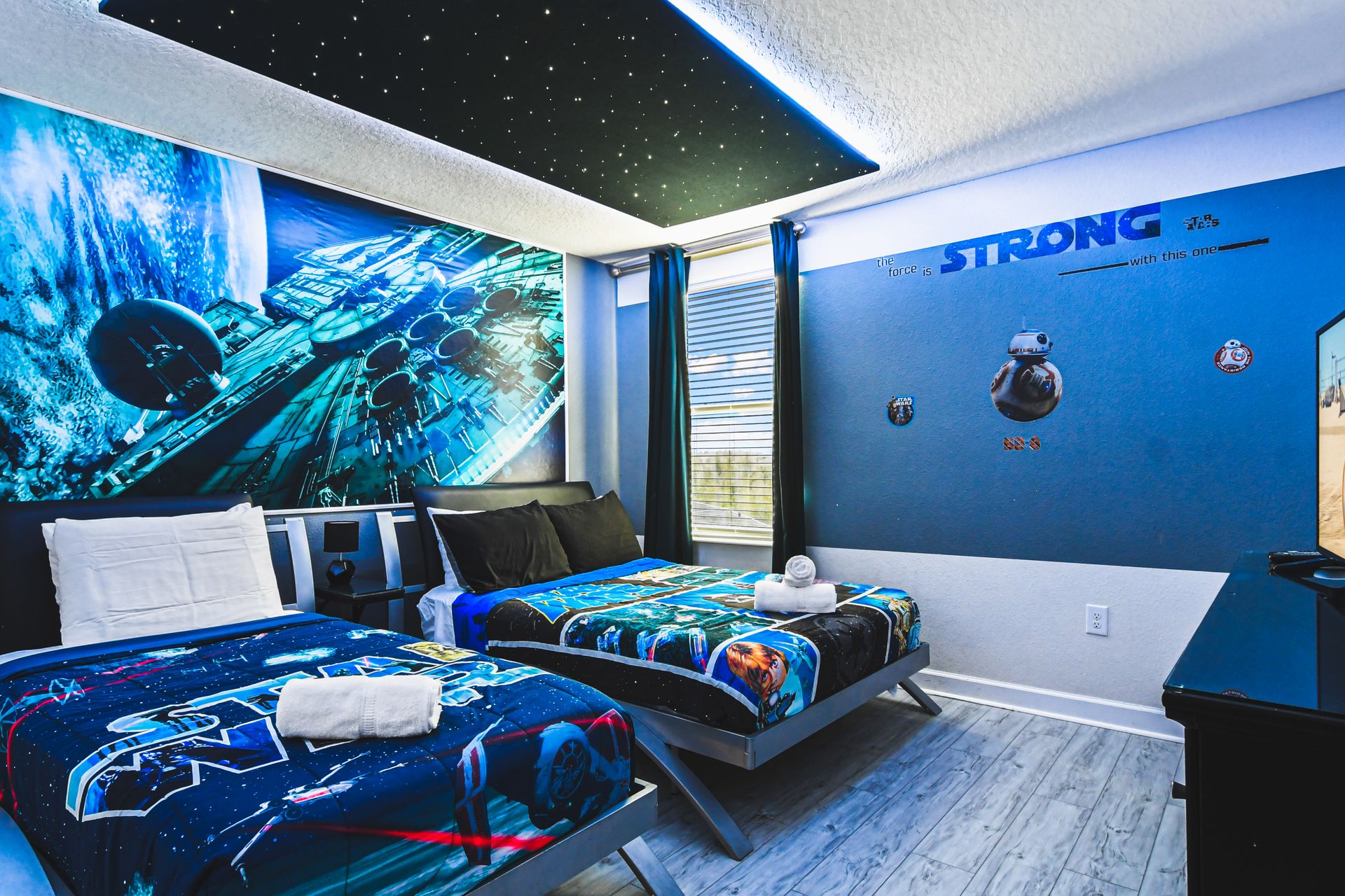 Star Wars-themed bedroom with two full beds for a galactic retreat