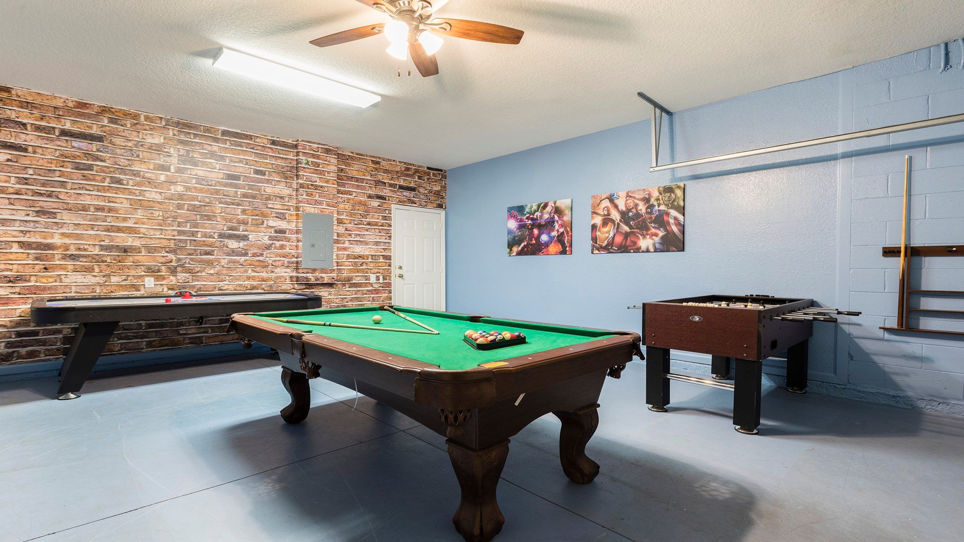 Fun-filled game room with pool, foosball, and air hockey for endless entertainment!