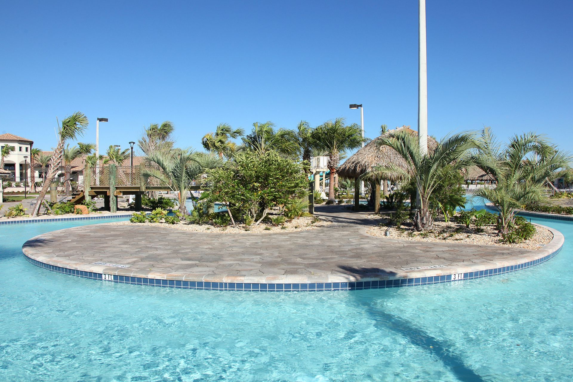 Enjoy a serene float in the crystal-clear lazy river oasis.