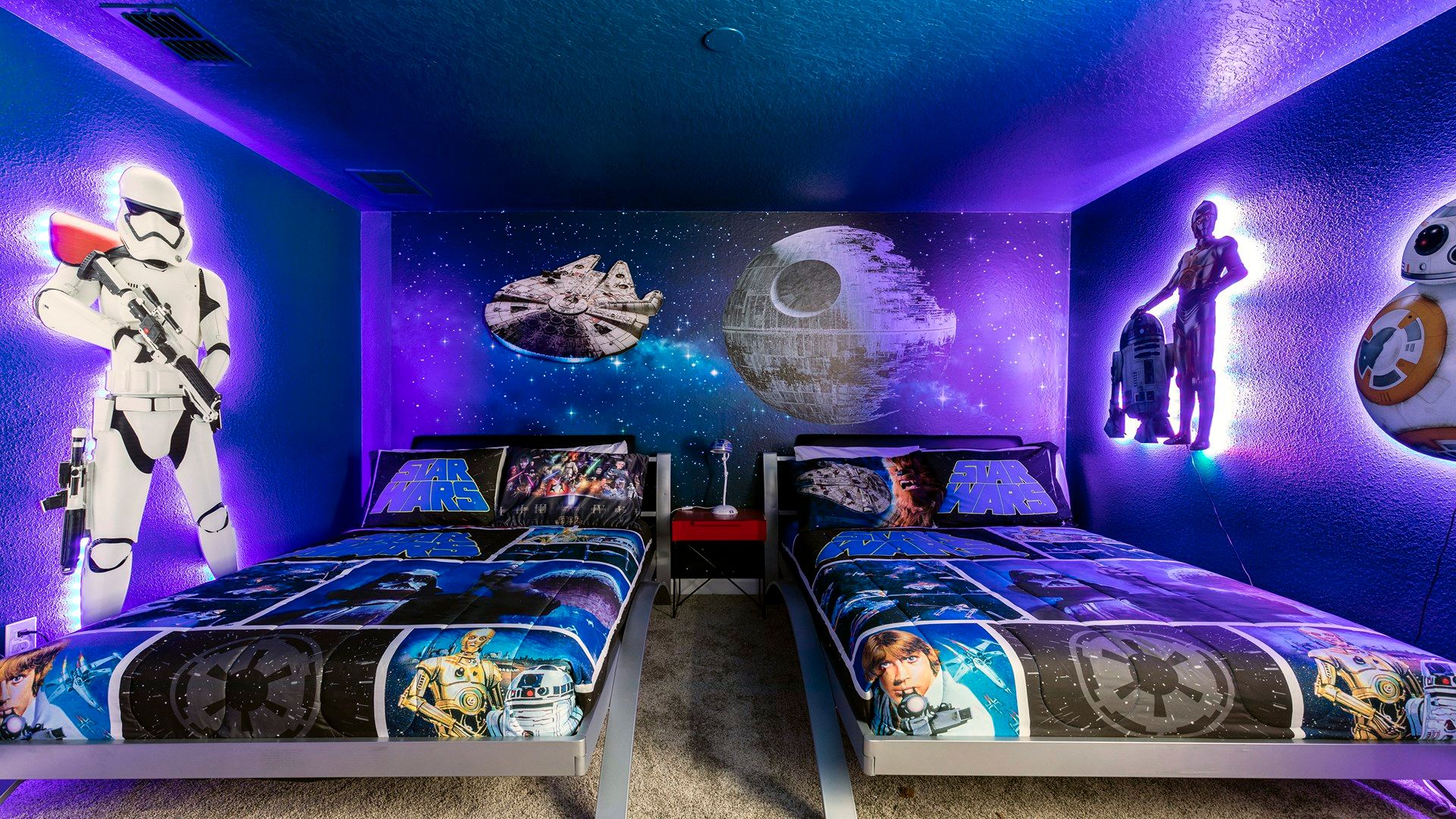 Star Wars-themed bedroom with glowing lights and out-of-this-world decor