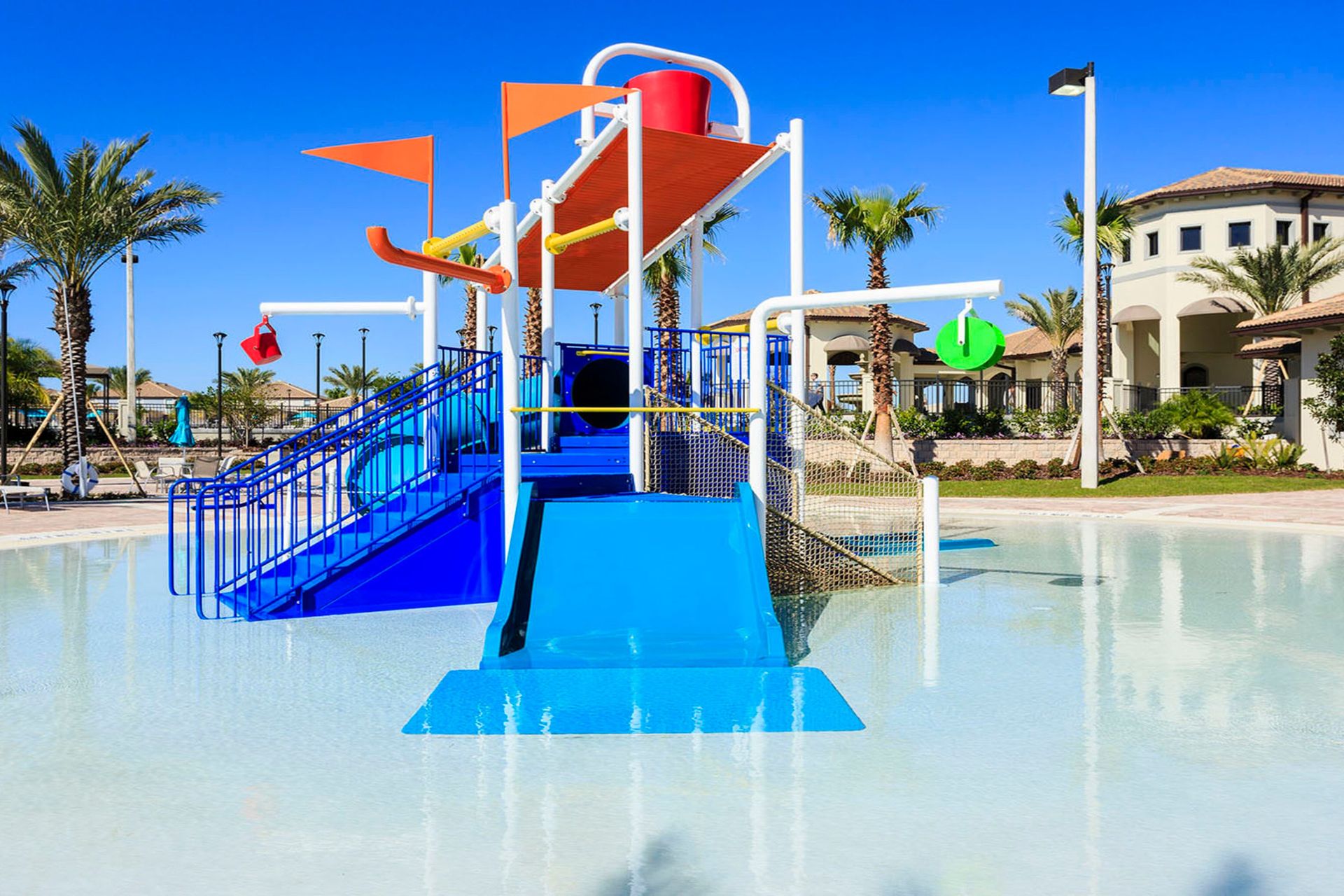 Exciting kids' splash zone with slides, water features, and colorful play area for endless family fun.