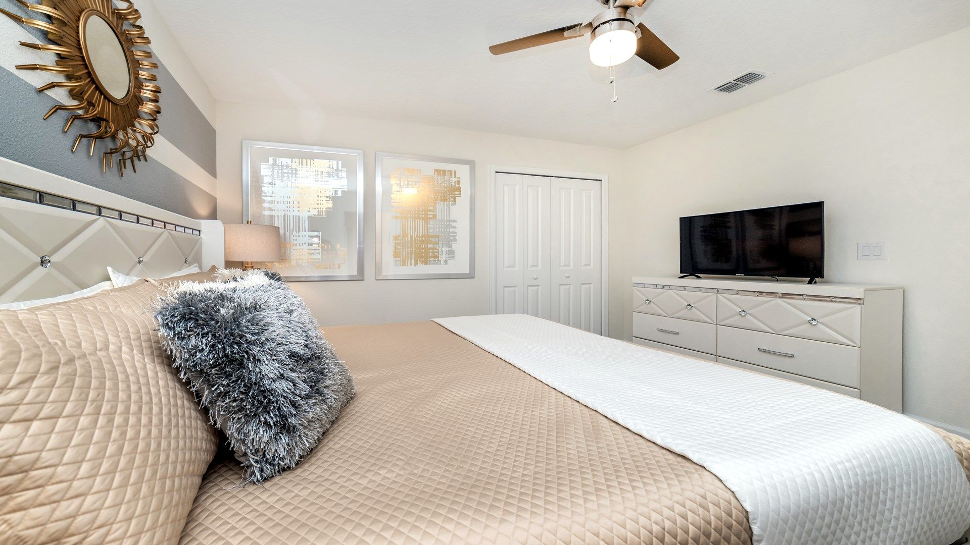 Cozy bedroom with a king bed, stylish decor, and a smart TV!