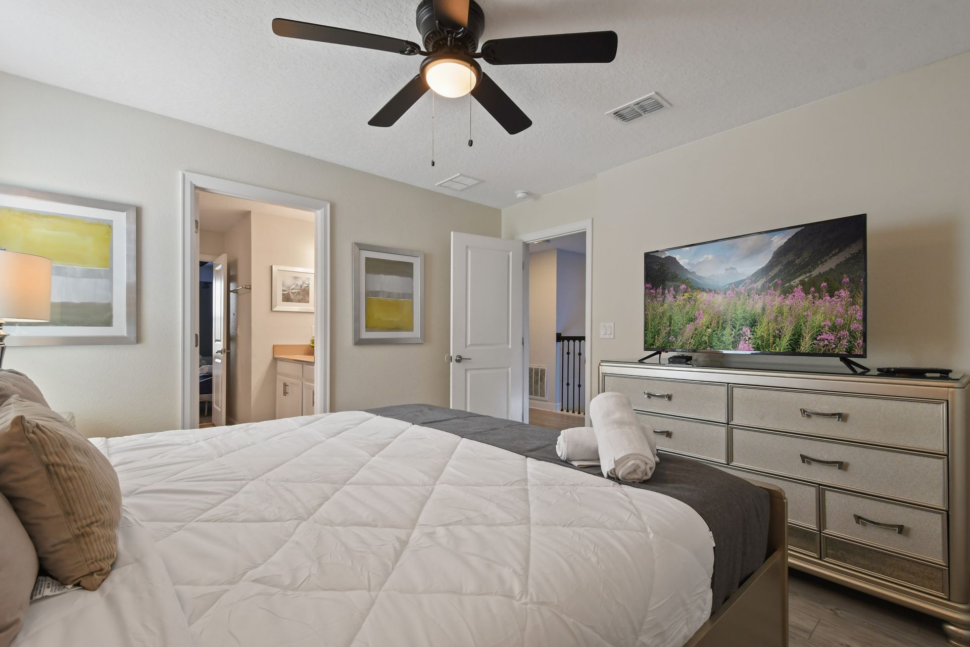 Elegant bedroom with soft tones, HDTV, and ensuite bathroom access!