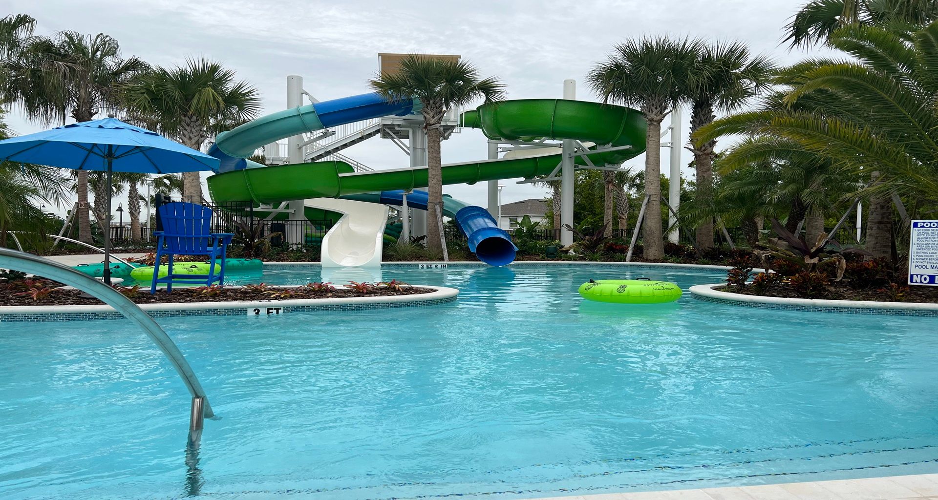 Twisting water slides and a relaxing pool create the perfect tropical escape!