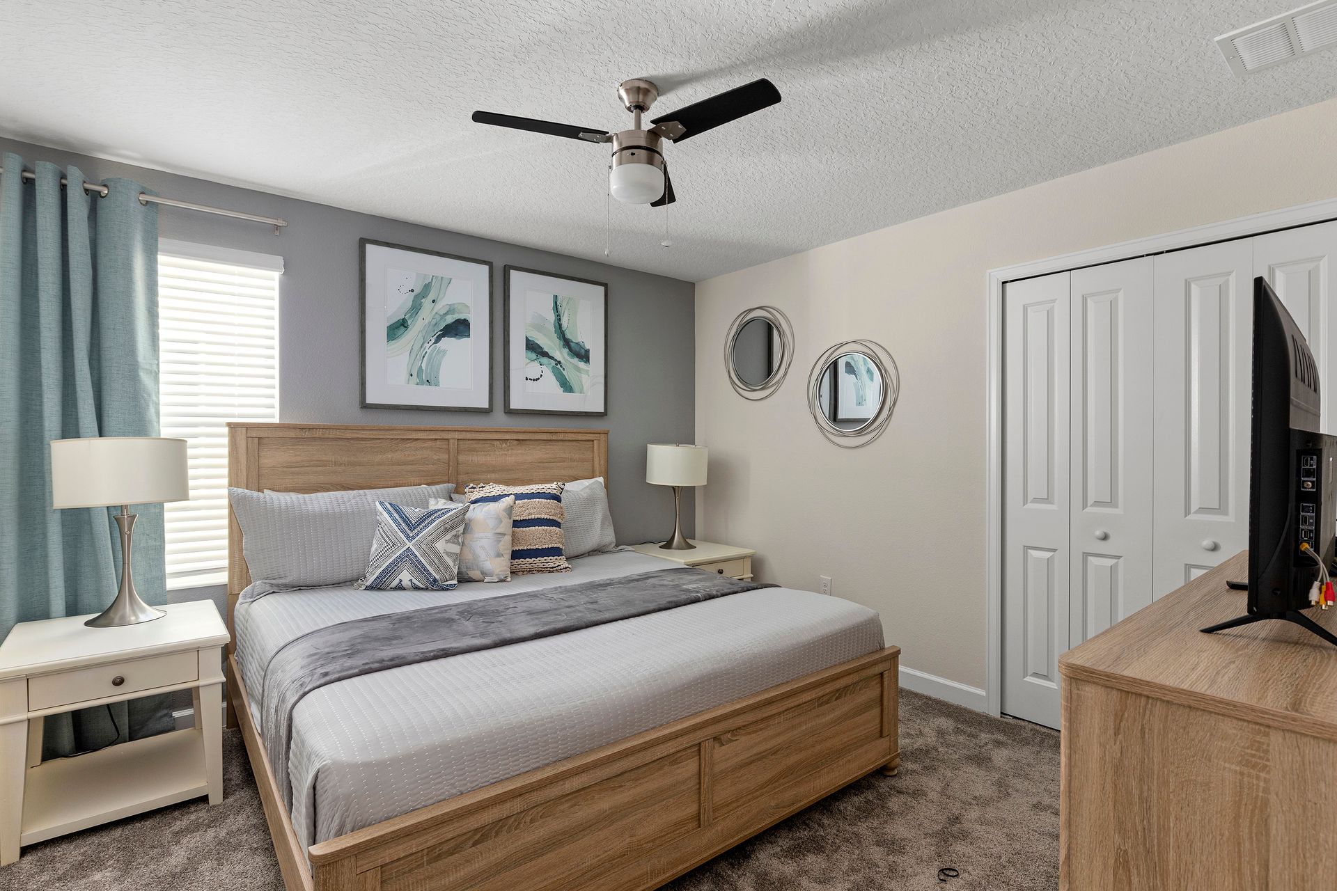 Relax in this spacious master bedroom featuring a comfortable king-sized bed, stylish decor, and ample natural light. This room provides a peaceful retreat, complete with an ensuite bathroom and thoughtful touches for a relaxing stay.