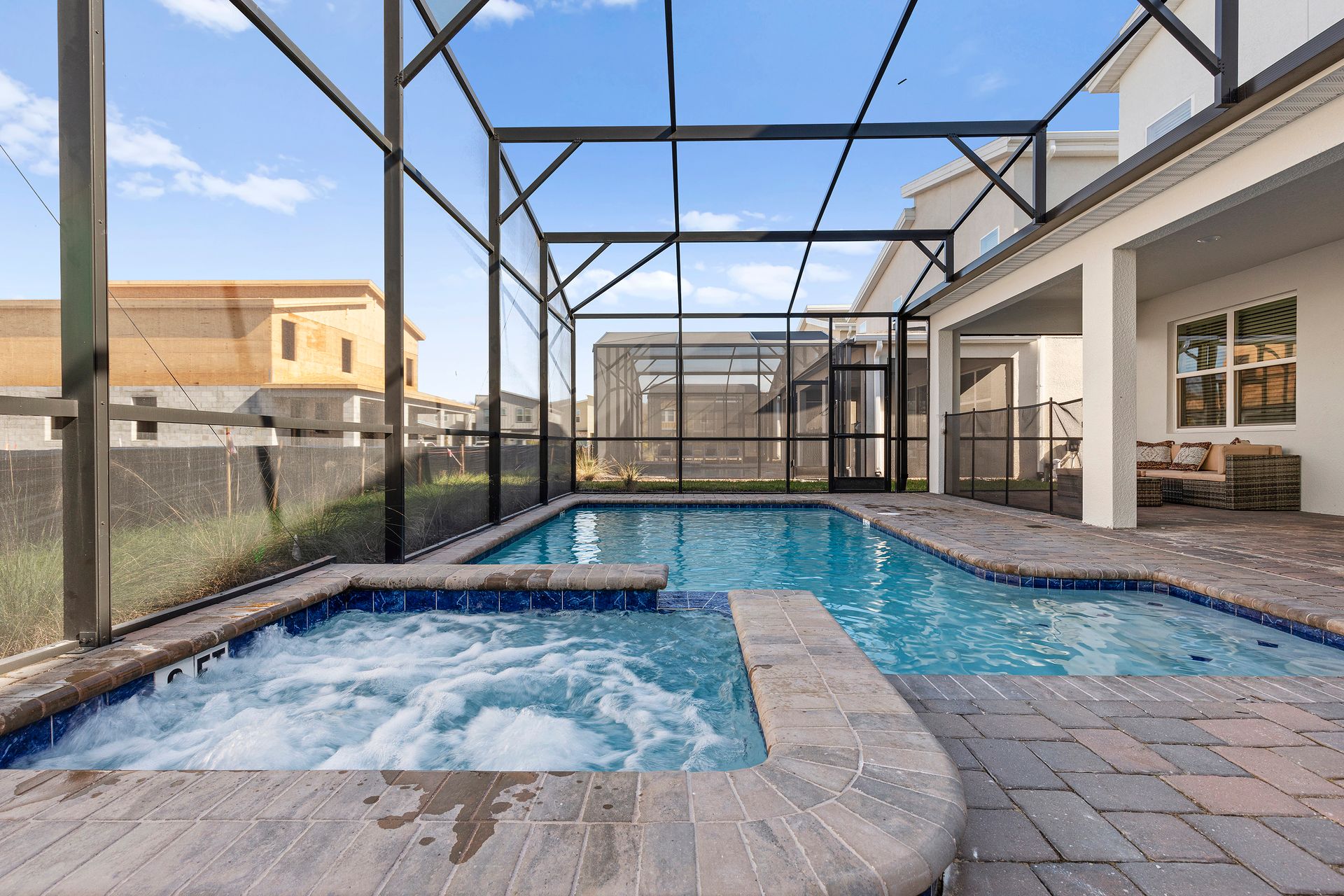 Enjoy the luxury of a private pool and spa right in your backyard, complete with a screened lanai for added privacy. Unwind under the sun, or have a delightful alfresco dining experience with stunning views—your personal oasis awaits!