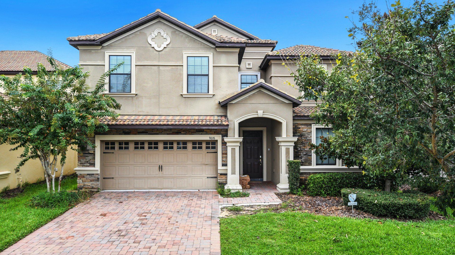 A modern and stylish home with a sleek design, characterized by clean lines and contemporary aesthetics