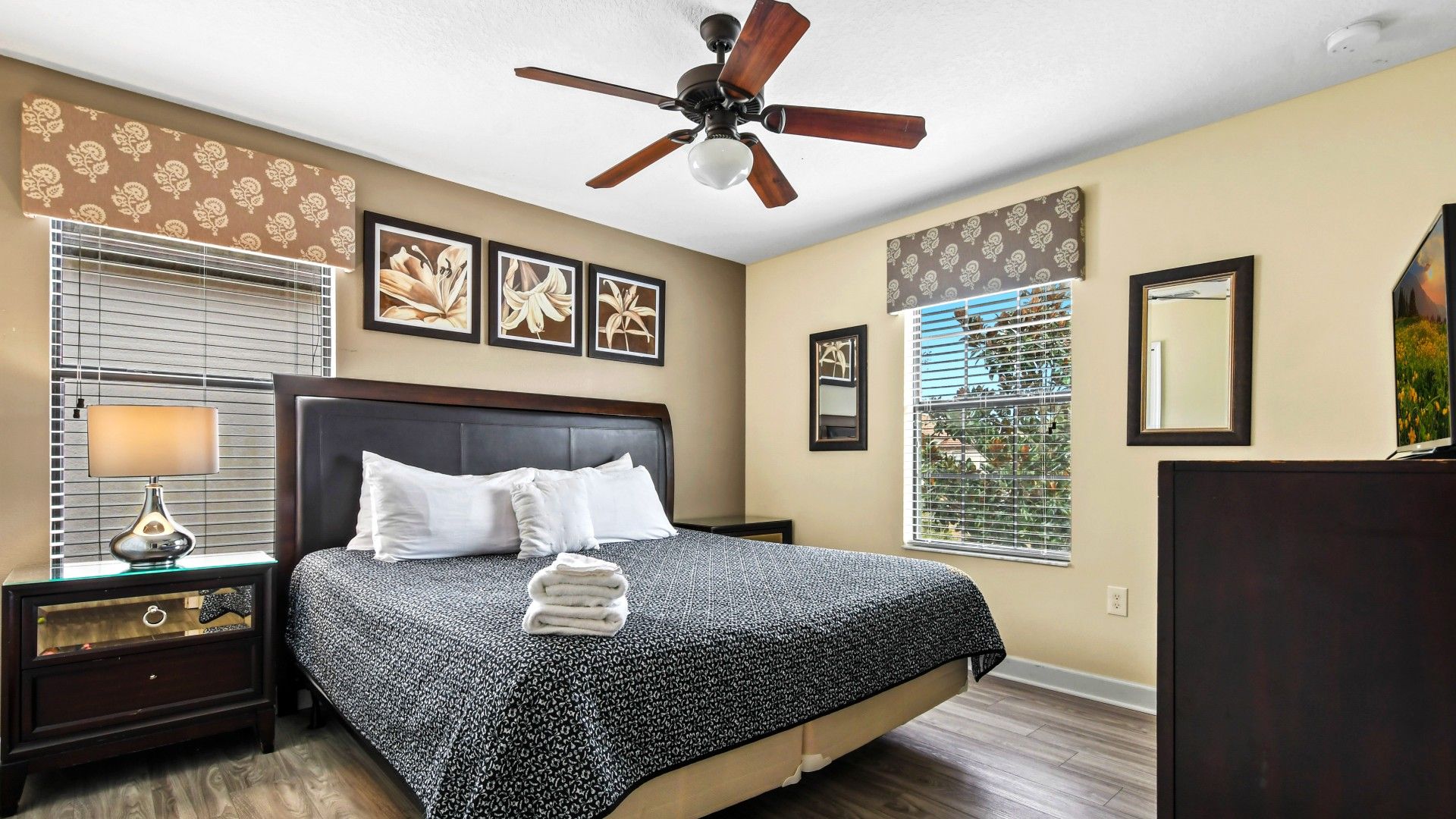 A bedroom offering a perfect blend of comfort and entertainment.