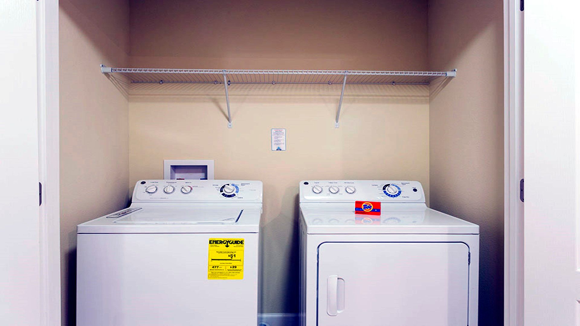 A laundry area equipped with a washing machine and dryer