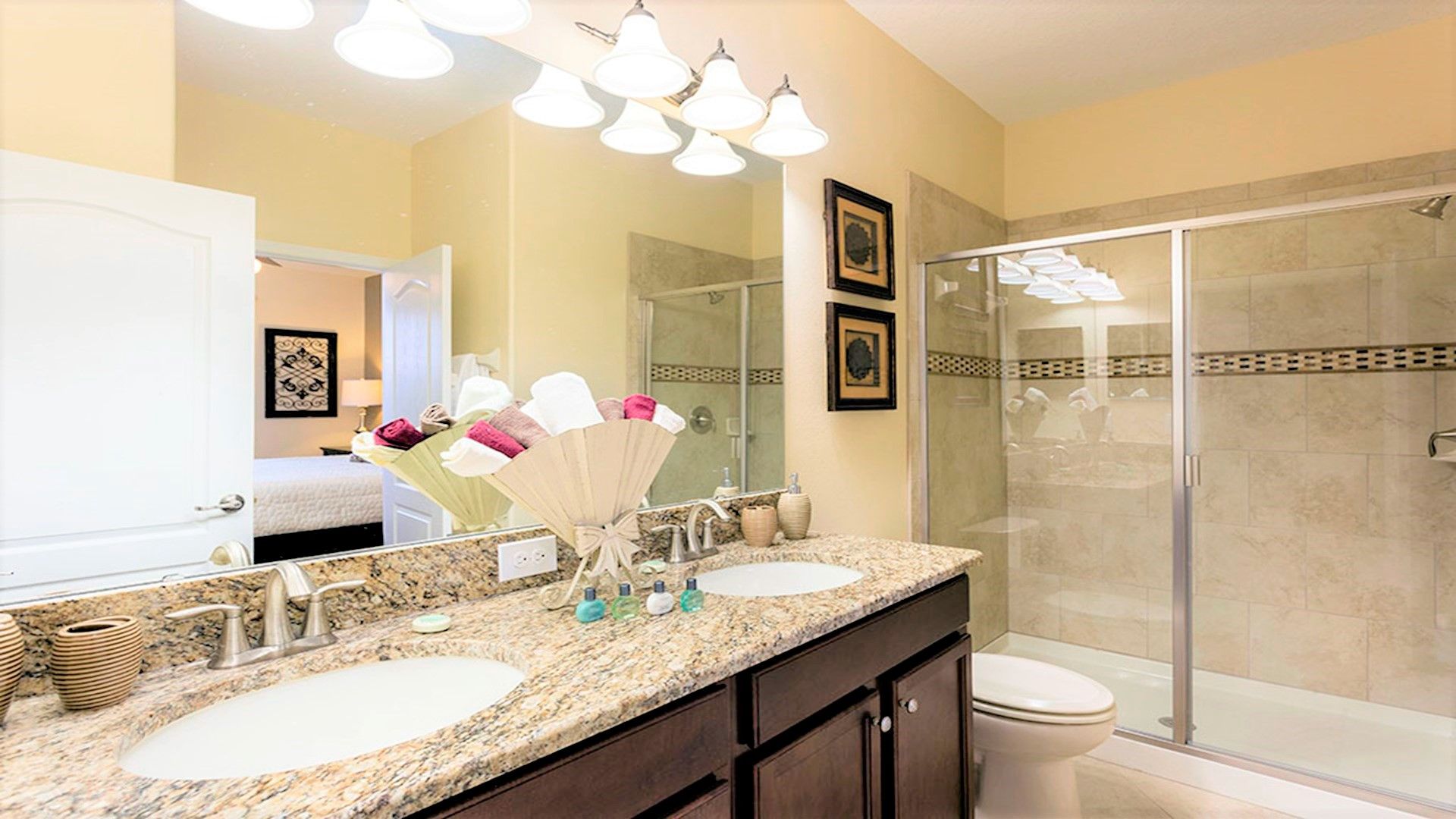 A full bathroom, complete with modern fixtures, a spacious vanity.