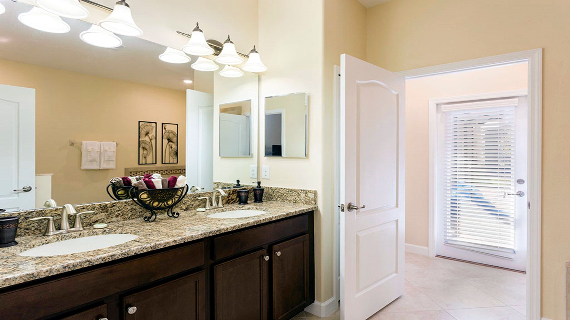 A full bathroom, complete with modern fixtures, a spacious vanity.
