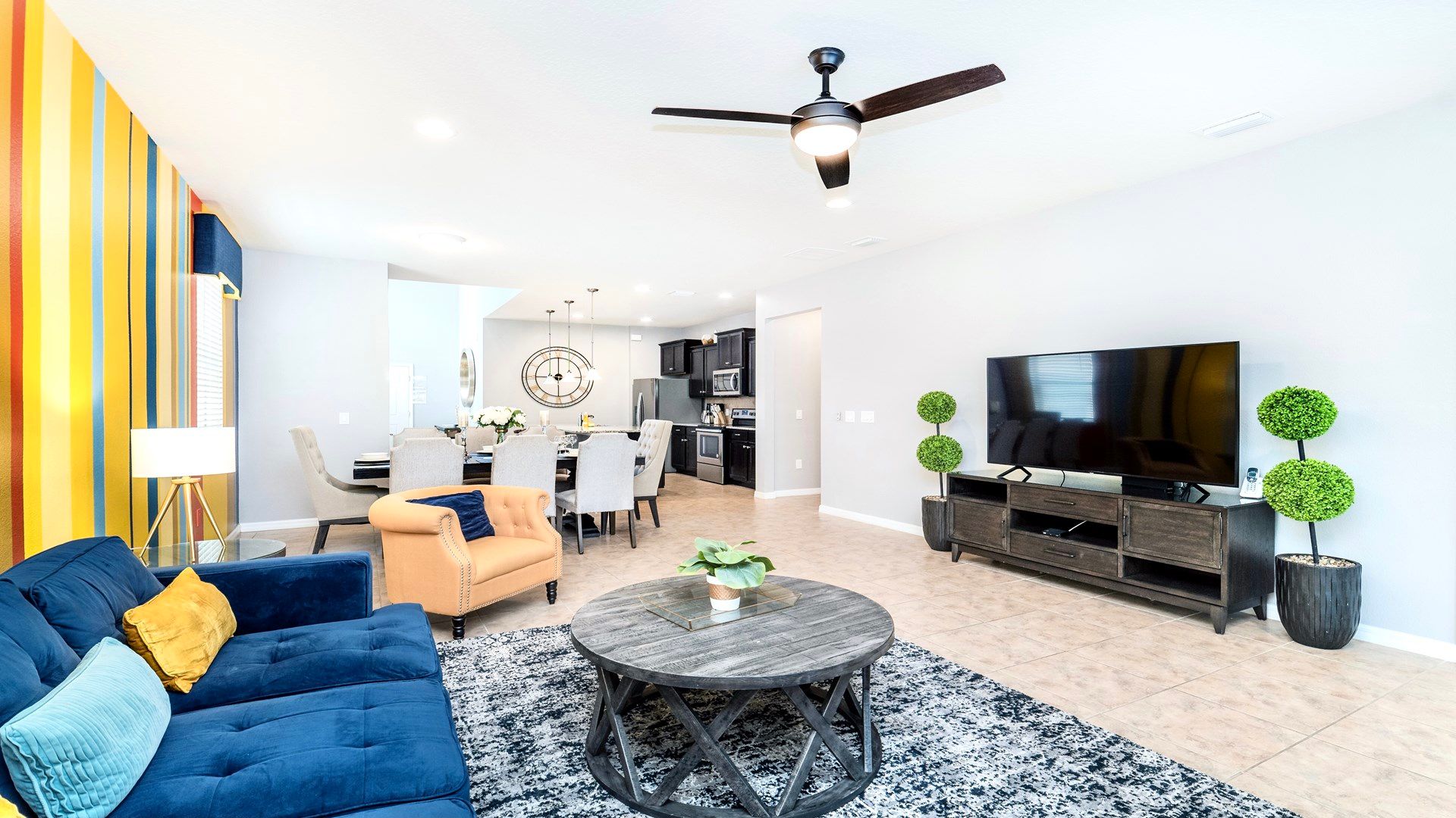 Kick back and relax in this cozy living room! Plush couches, big screen for movie marathons & games nights await.