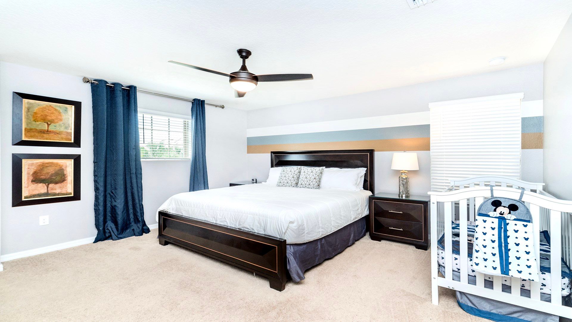 King Bedroom: Cozy retreat featuring a plush king-sized bed and a TV