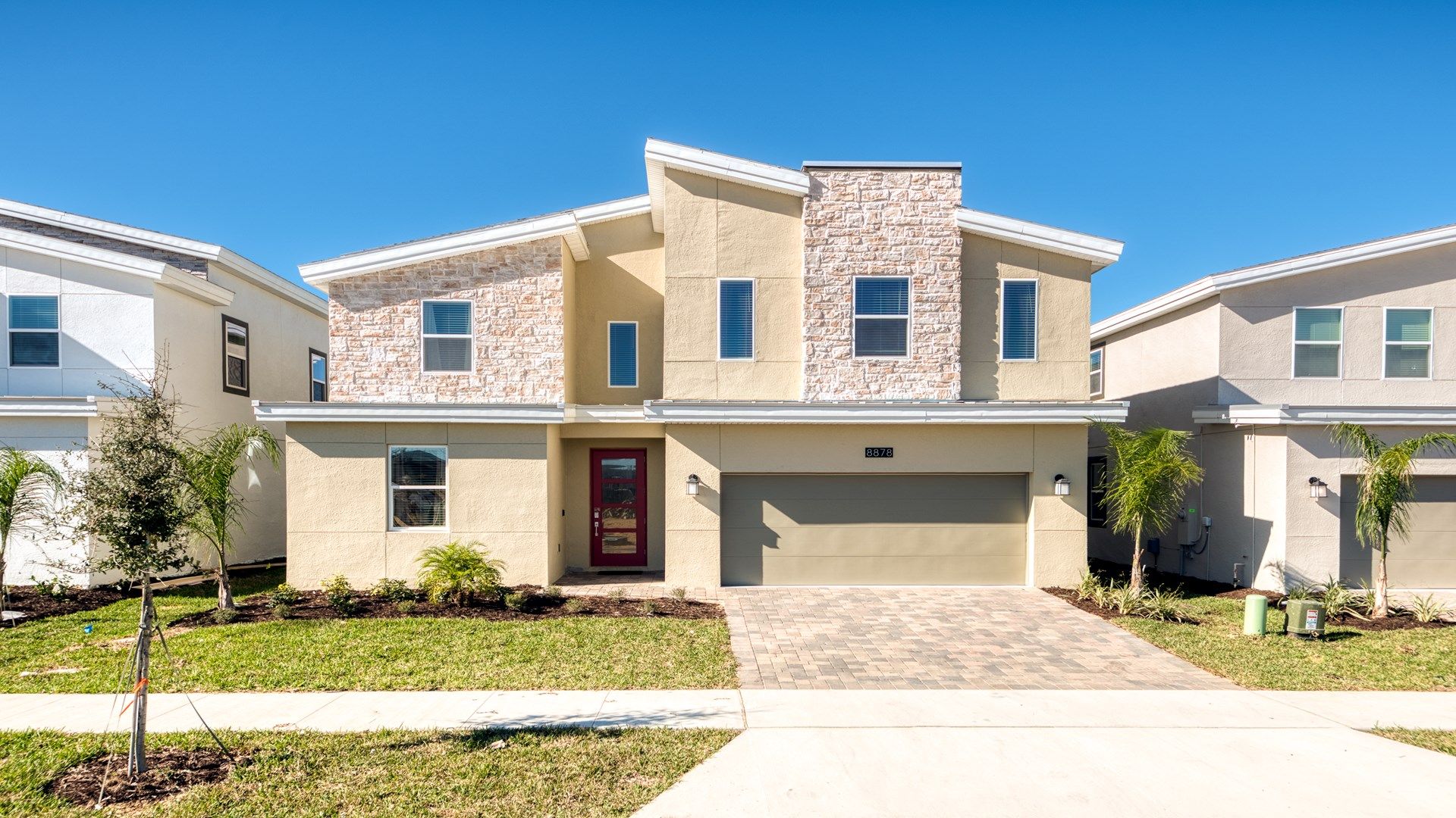 Sophisticated modern house characterized by a minimalist aesthetic.