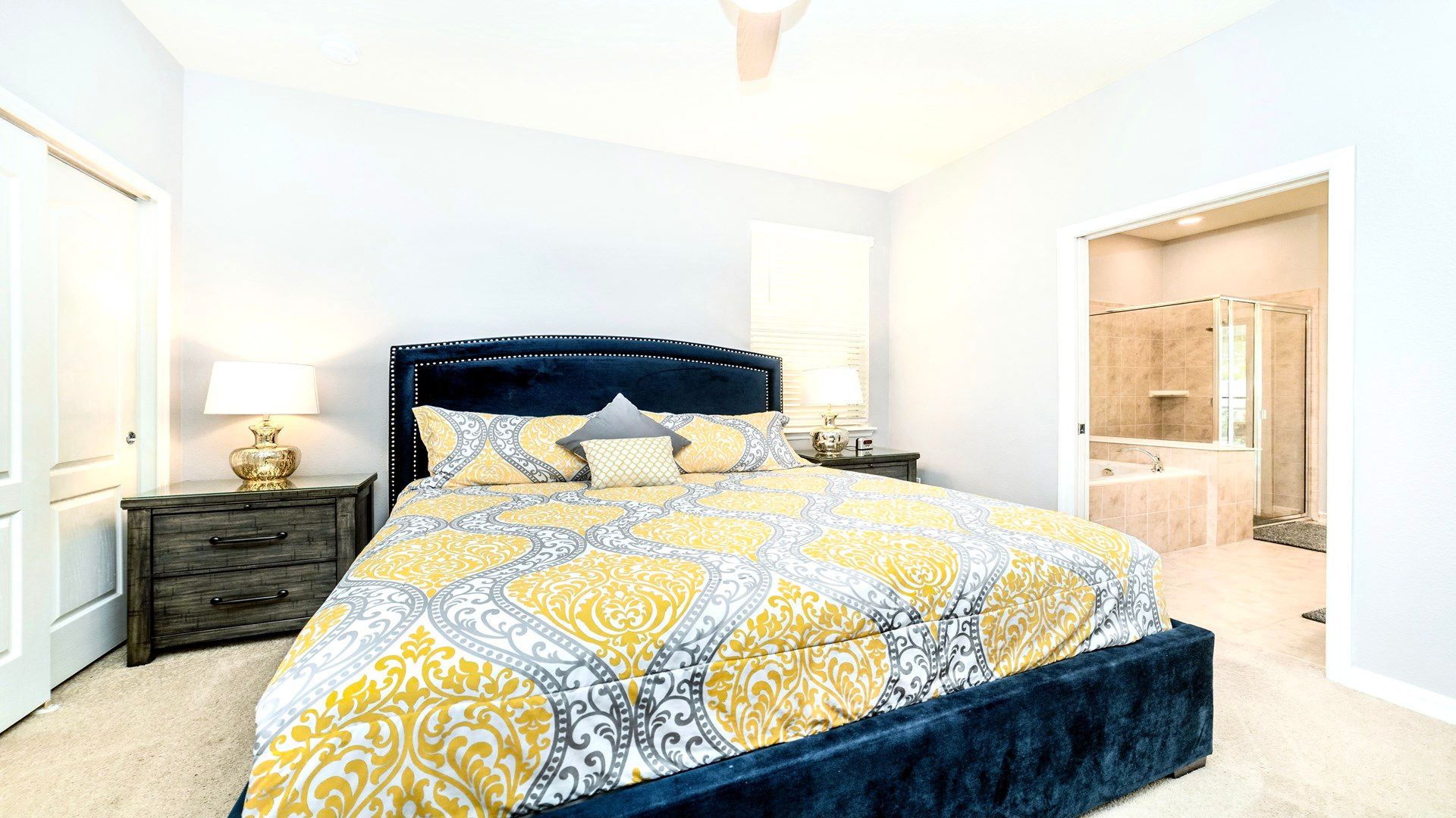 King Bedroom: Cozy retreat featuring a plush king-sized bed