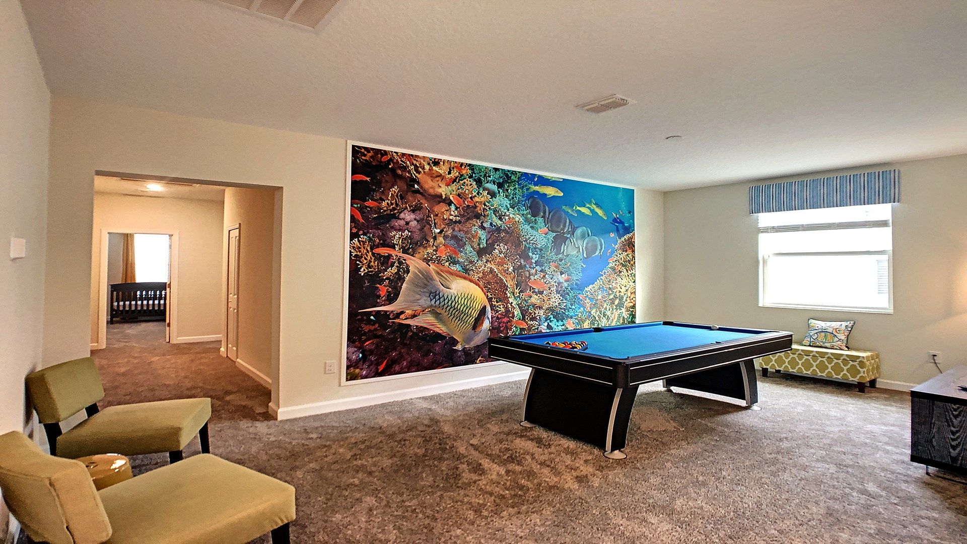 Have a hit of pool with friends in the upstairs games loft