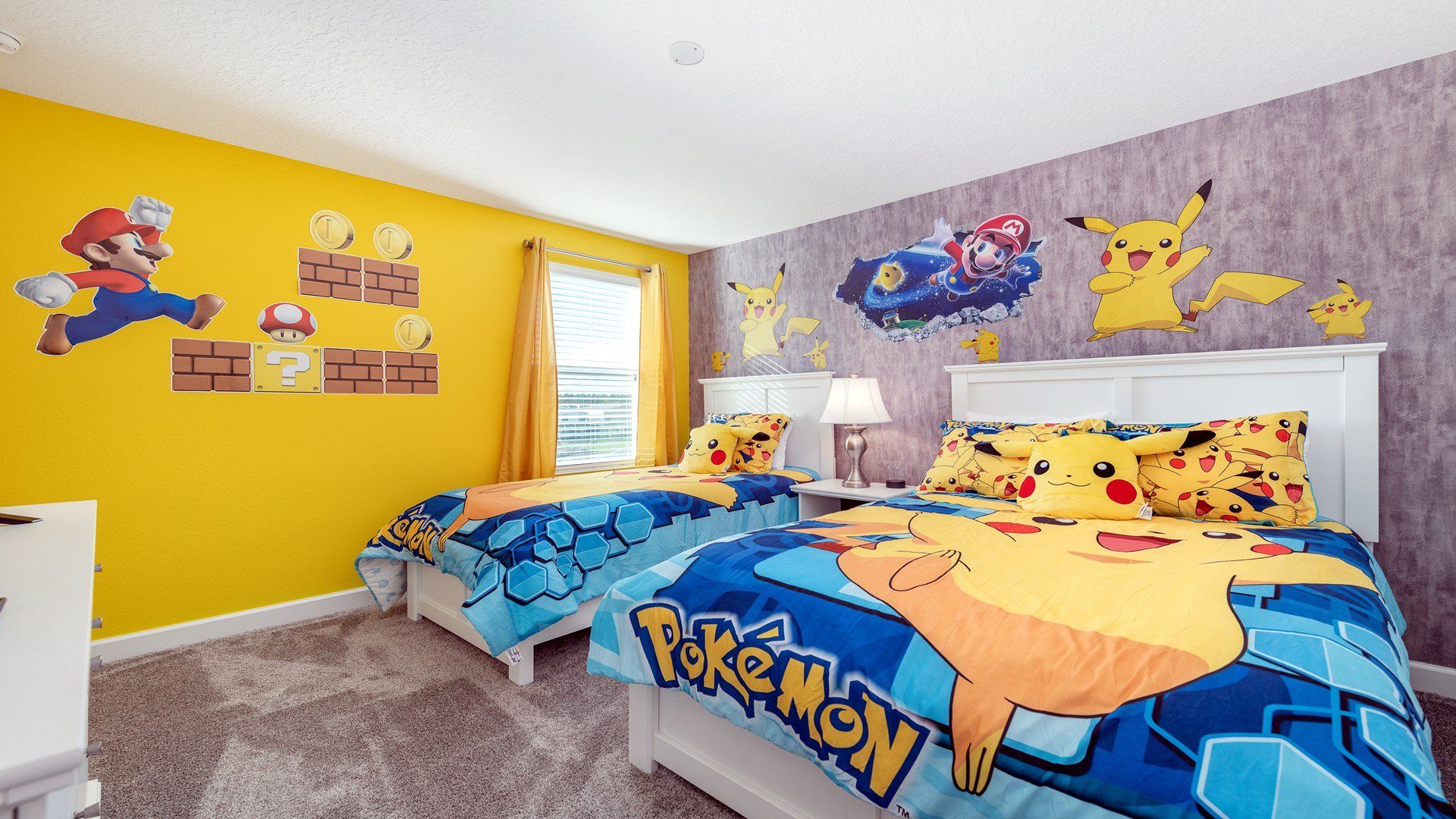 Colorful gaming-themed bedroom with twin beds, Mario & Pokémon decor.