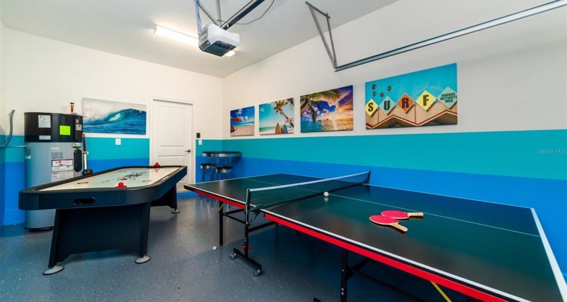 Bring the fun home with ping pong, air hockey, and a beach-themed game room.
