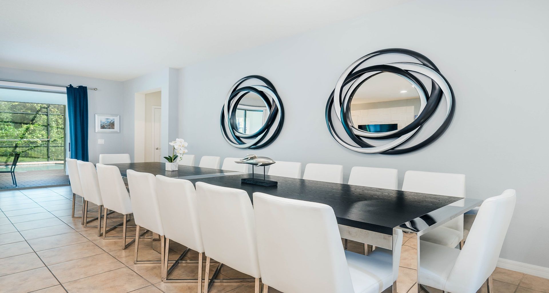 Spacious modern dining room with seating for 14, perfect for group gatherings.