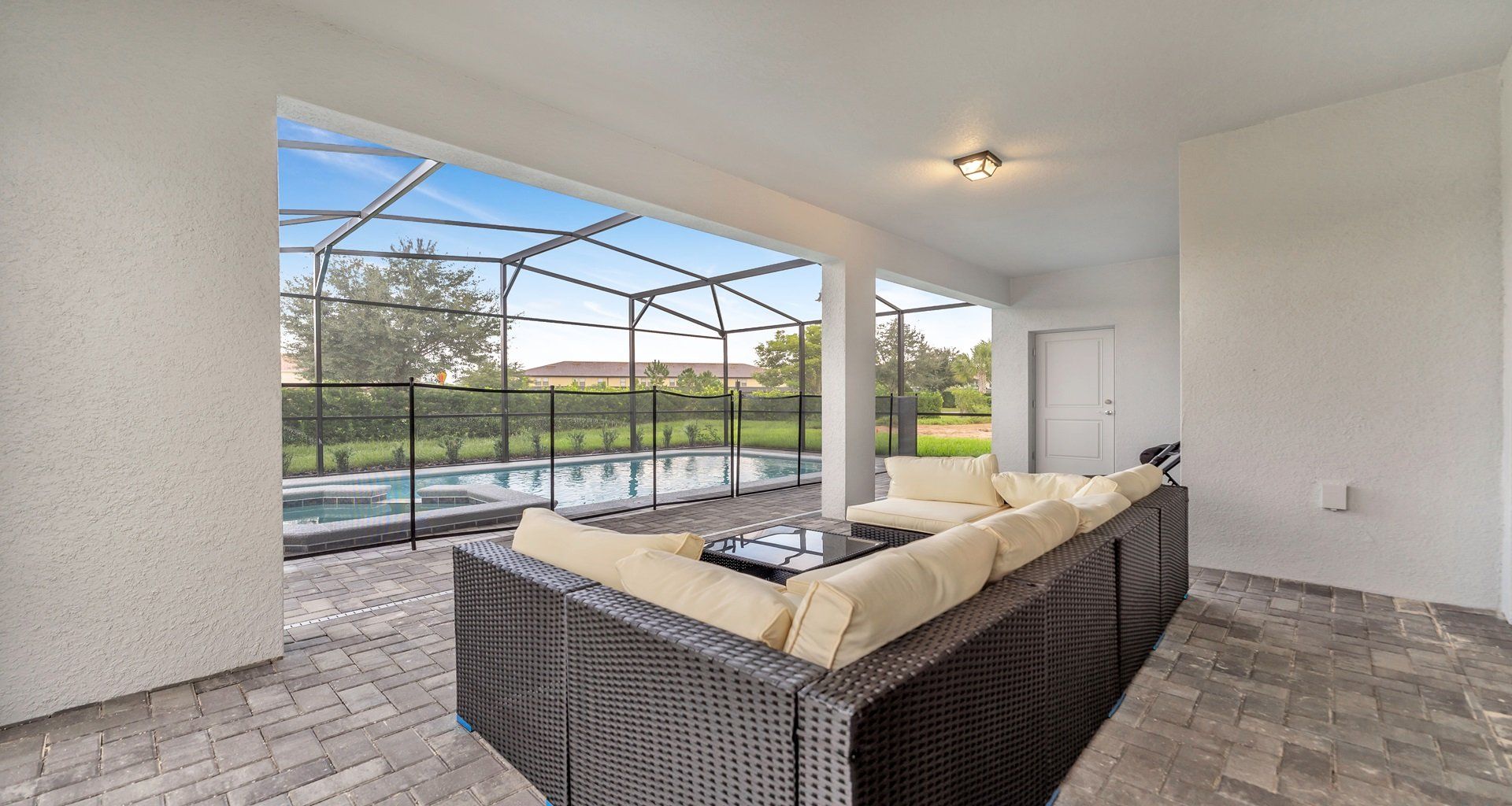 Seating with pool view, offering relaxation in a scenic setting