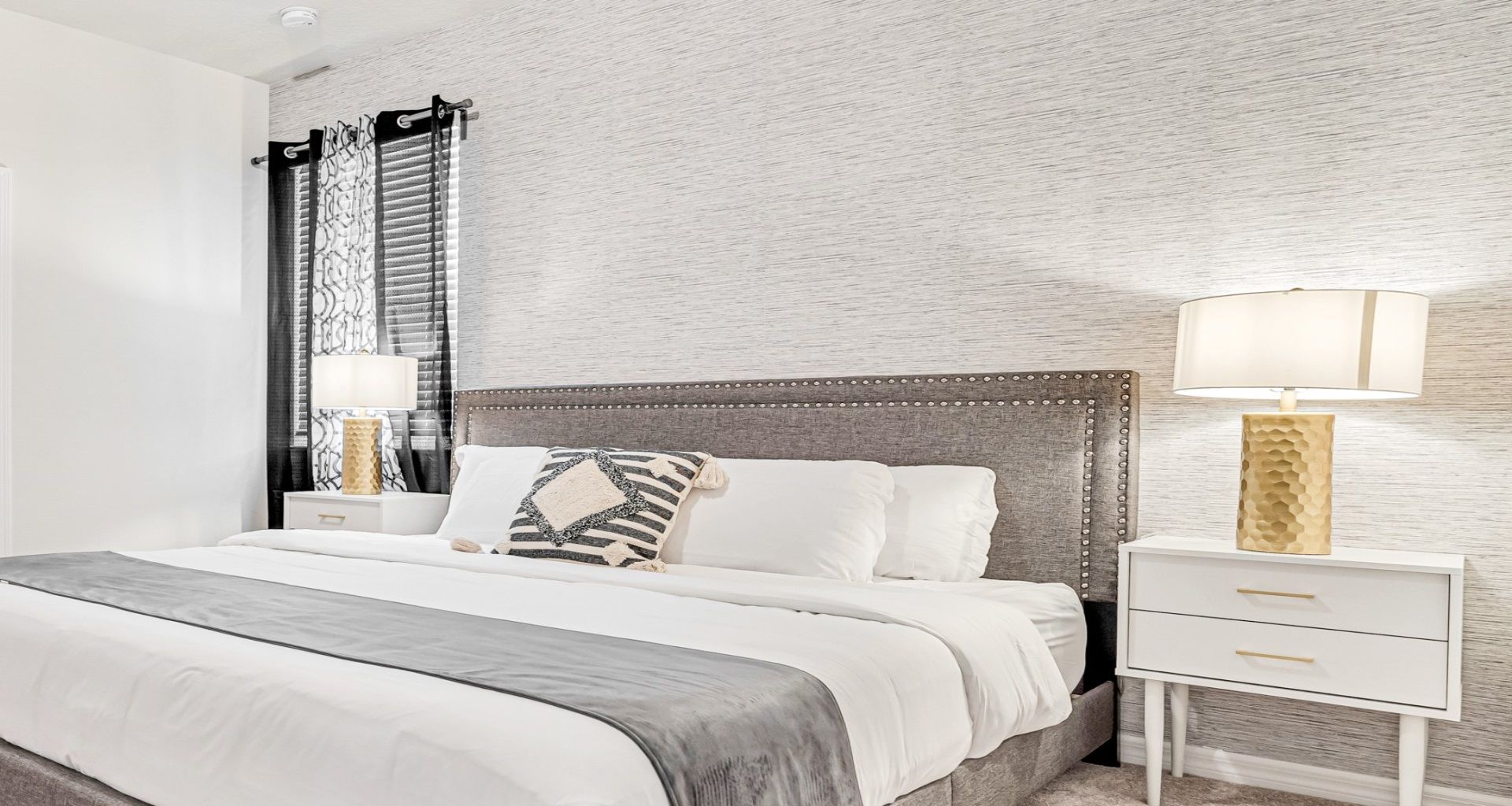 Sophisticated white and gray bedroom