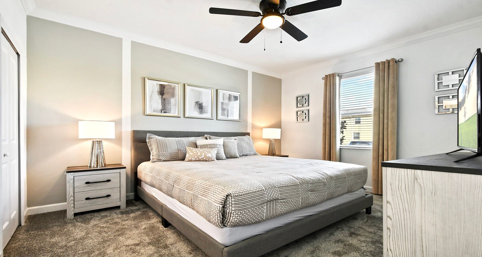 The roomy second-level bedroom is equipped with a Smart TV, combining ample space with modern entertainment for a comfortable.