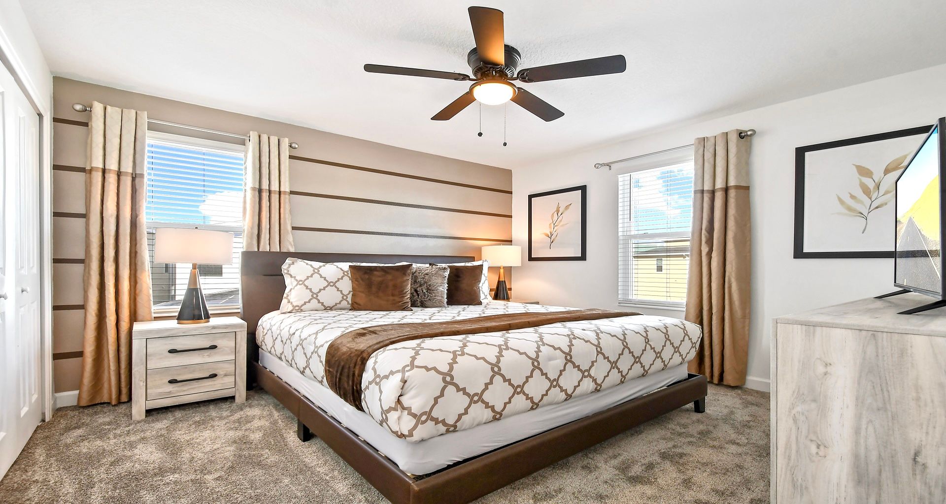 Inviting king-sized bedroom designed for coziness, offering a warm and comfortable.