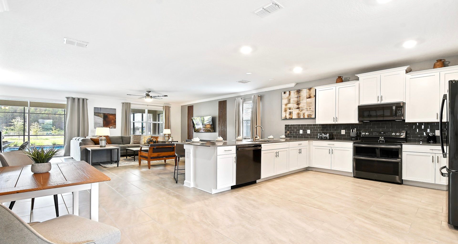 The expansive chef's kitchen is fully equipped with all the amenities and tools you could possibly need.