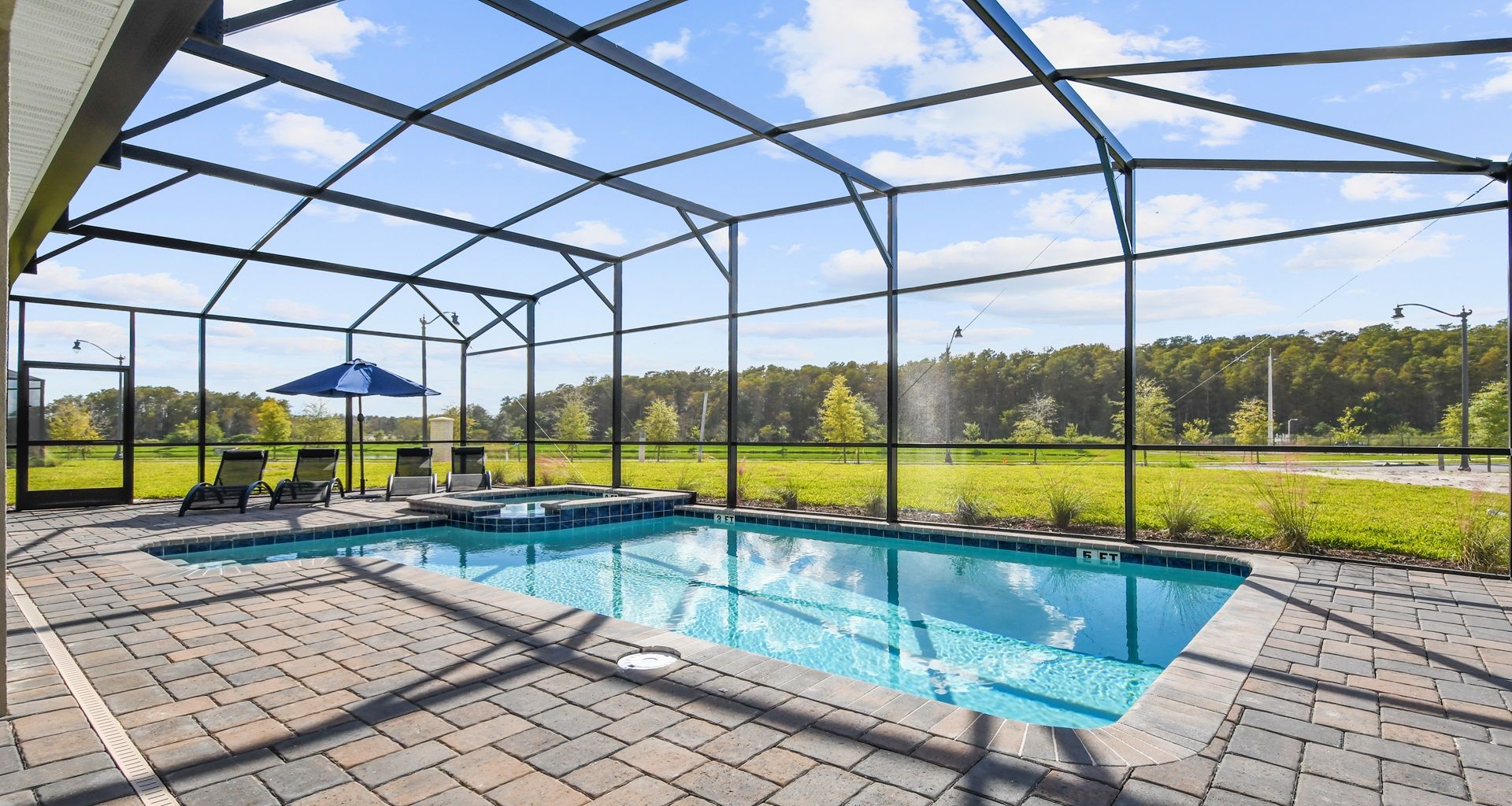 Experience the breathtaking beauty of nature with your own private pool, offering stunning views of lush green surroundings