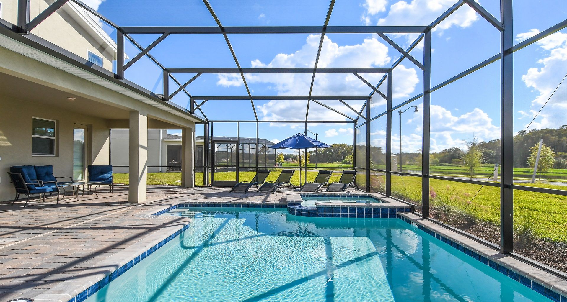 Experience the breathtaking beauty of nature with your own private pool, offering stunning views of lush green surroundings